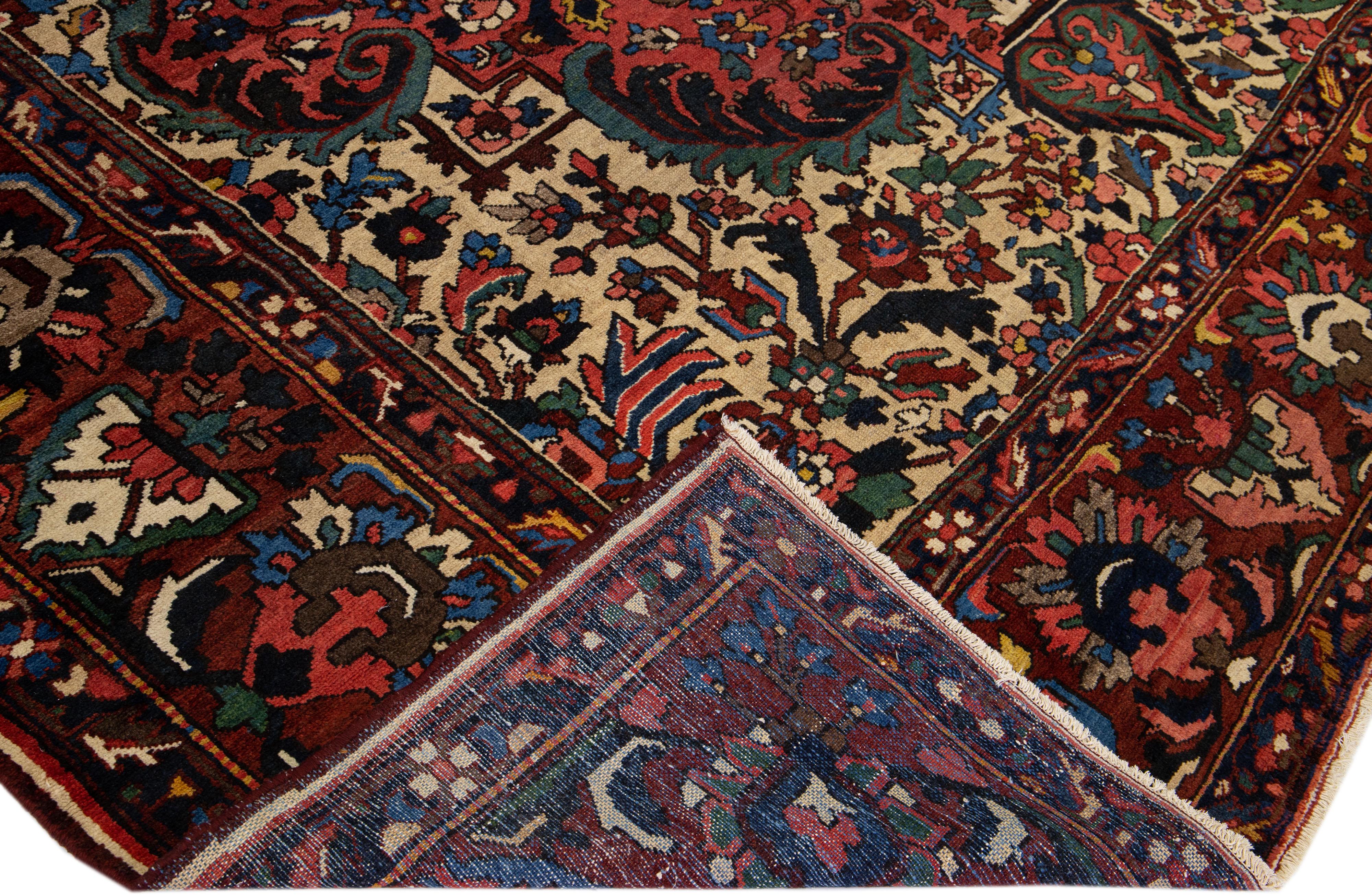 Antique Persian Bakhtiari Red Handmade Wool Rug with Multicolor Rosette Design In Good Condition For Sale In Norwalk, CT