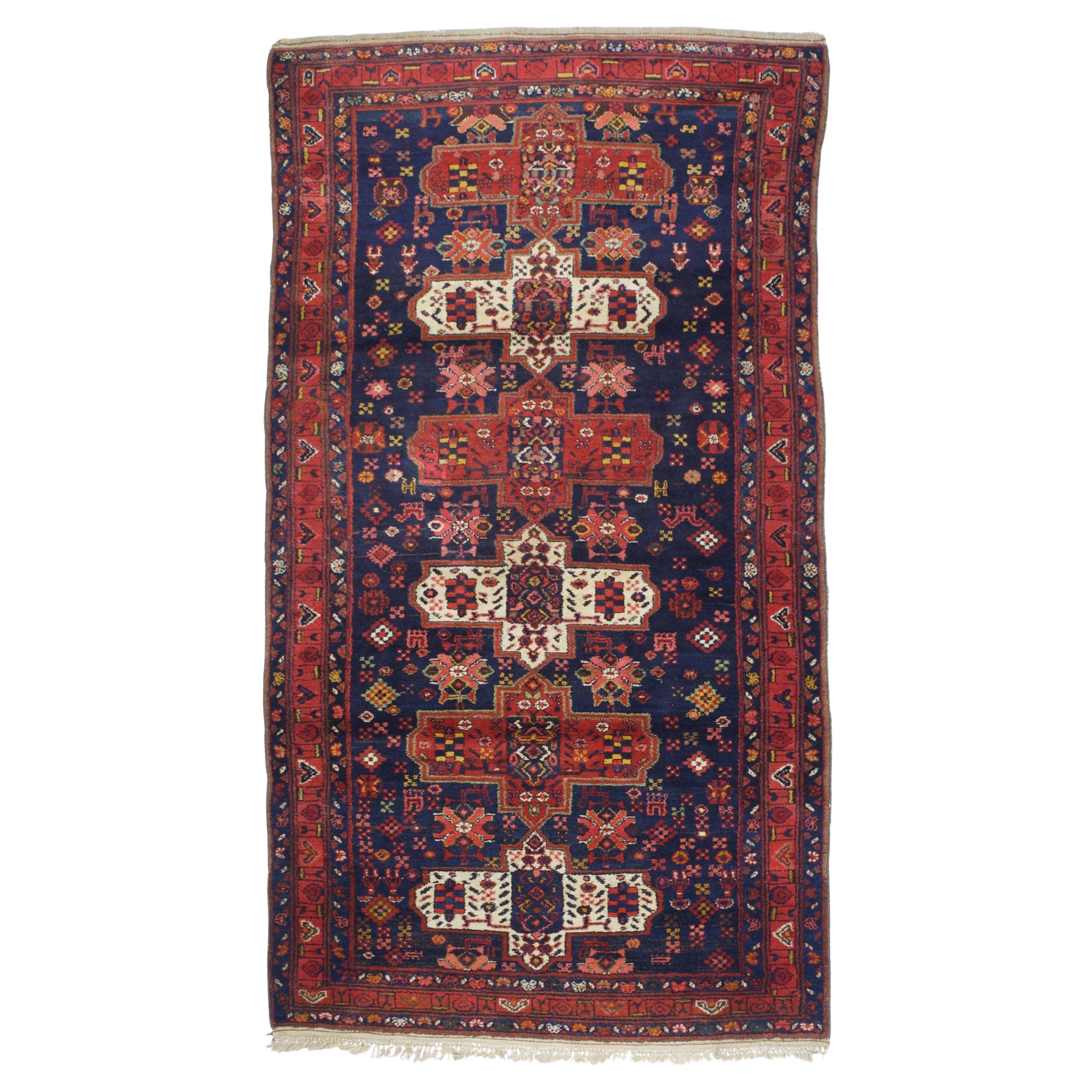 Antique Persian Bakhtiari Rug 4'9" x 8’7"