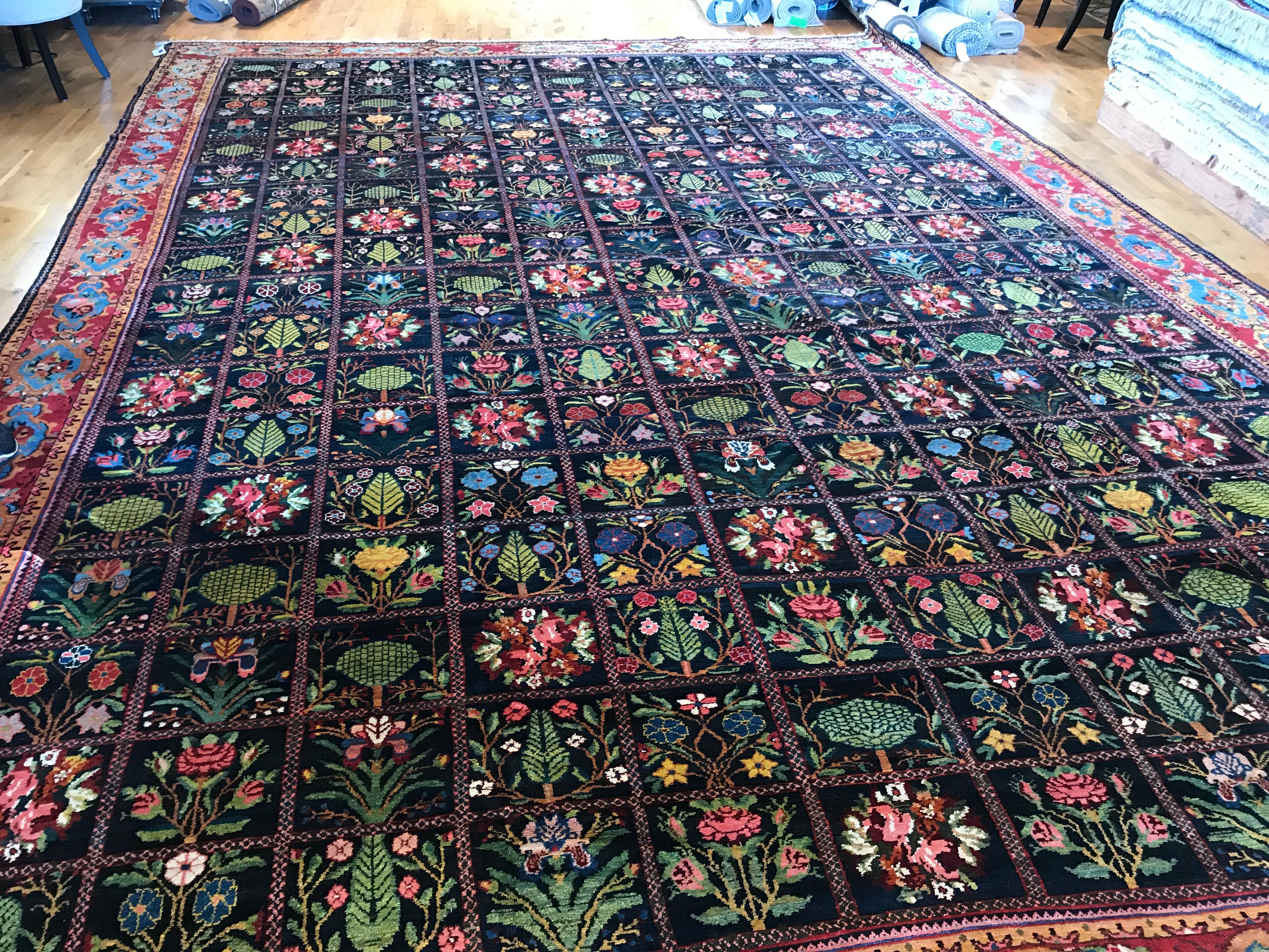 Antique Persian Bakhtiari Rug

Red floral border with geometric black field color. The field is compromise of symbolic flowers and trees that grows in the region. All wool, natural vegetal dyes, hand-knotted in Iran.