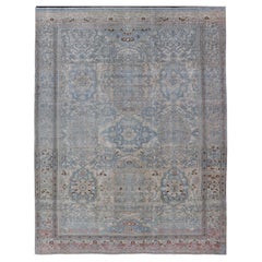 Tapis persan ancien Bakhtiari avec médaillons à fleurs sur toute la surface et motifs géométriques 