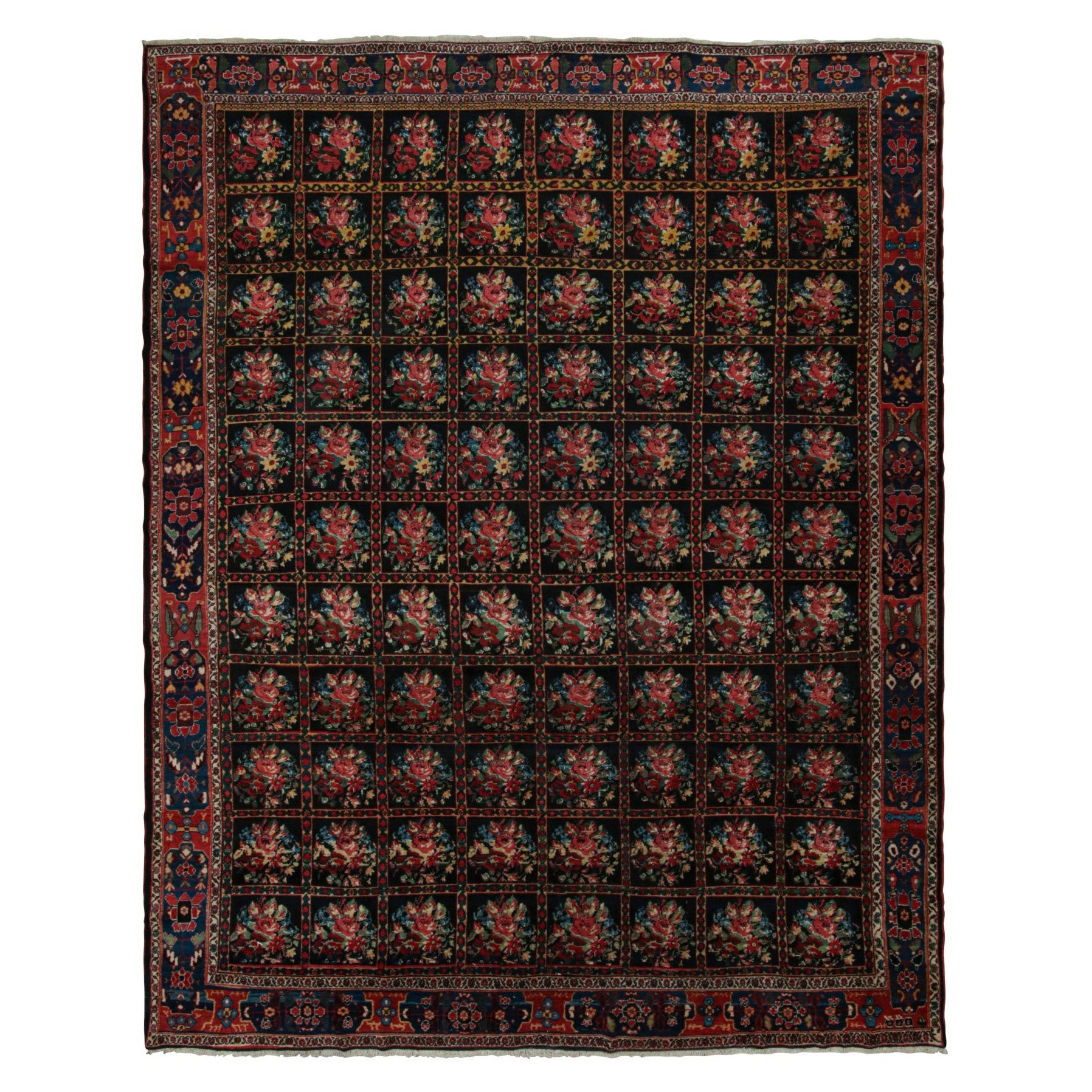 Tapis persan Bakhtiari ancien avec des fleurs noires, rouges et bleues en vente
