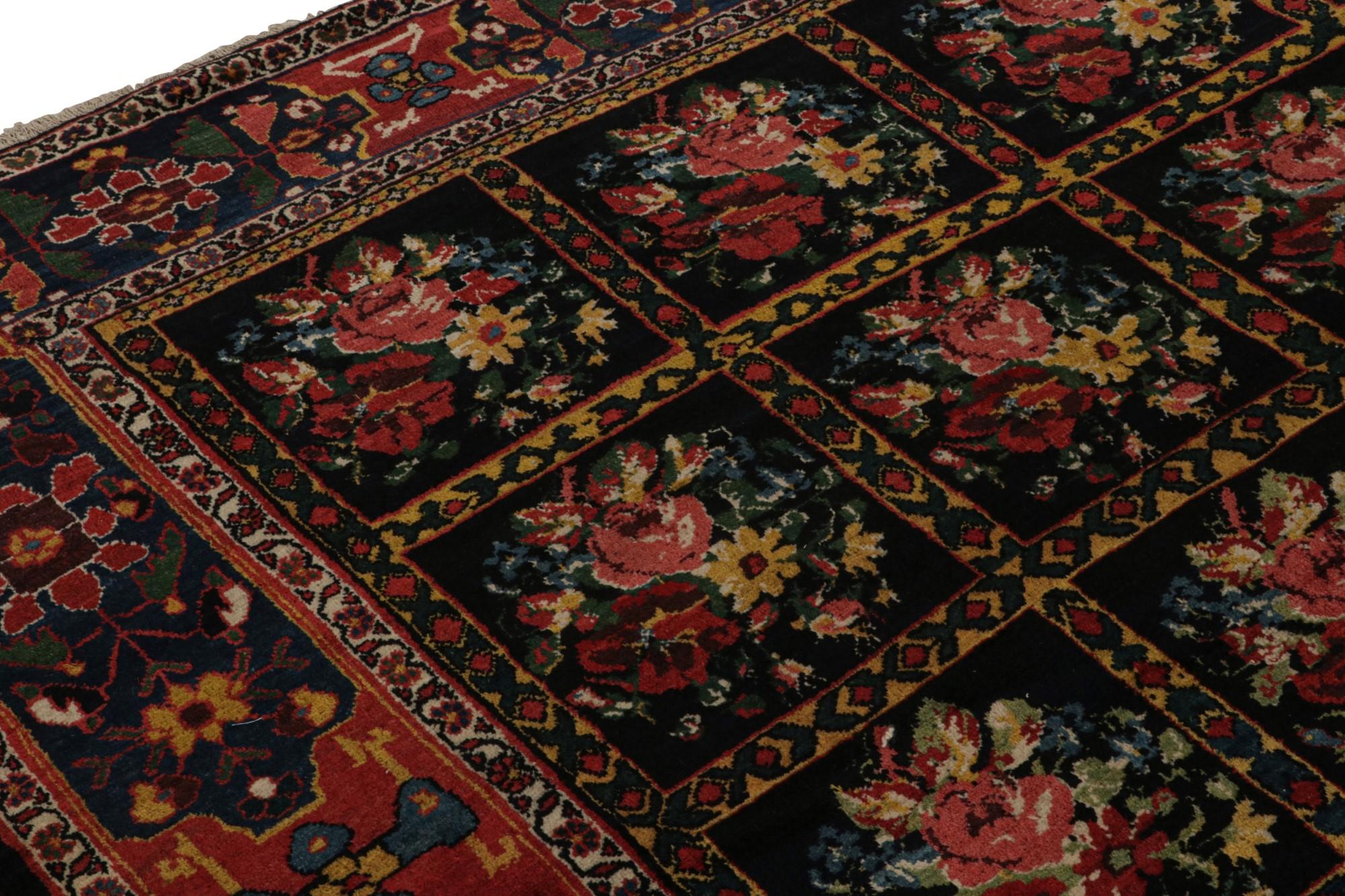 Antique Persian Bakhtiari Rug with Black, Red and Blue Florals In Good Condition For Sale In Long Island City, NY