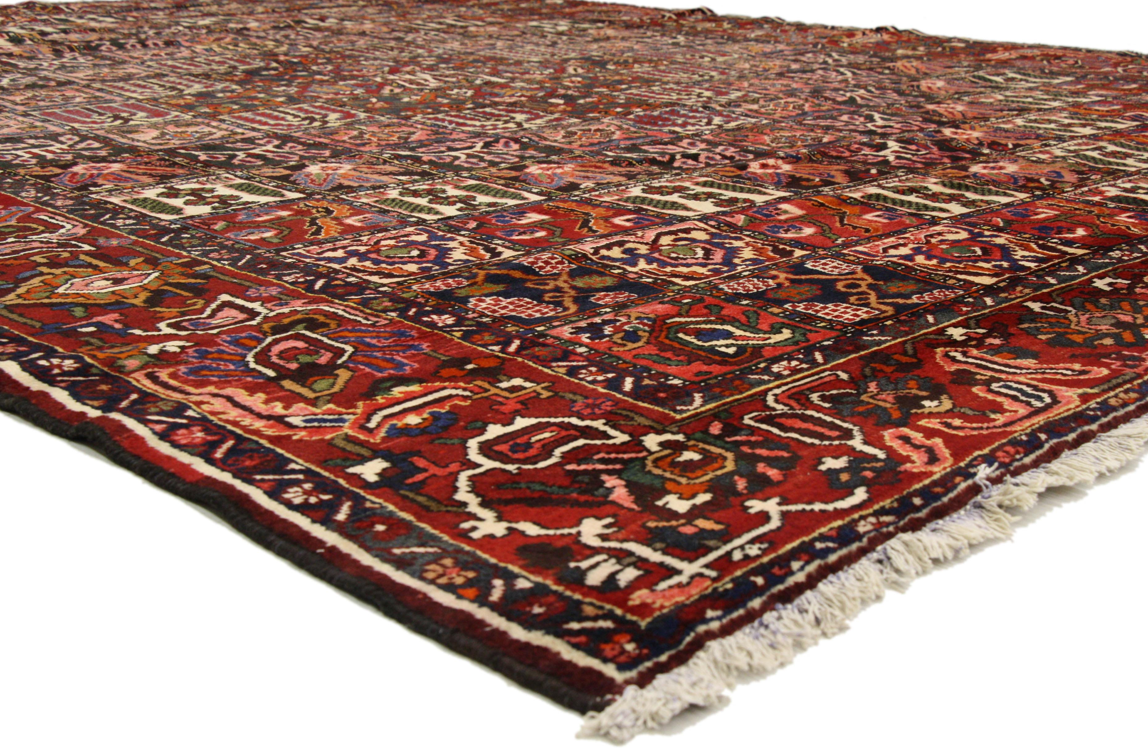 71802 Antique Persian Bakhtiari Rug with Four Seasons Garden Design 11’06 x 15’06. Rich jewel tones integrated with a rich patina, this antique Persian Bakhtiari rug features the Four Seasons design with a traditional modern style. Classically