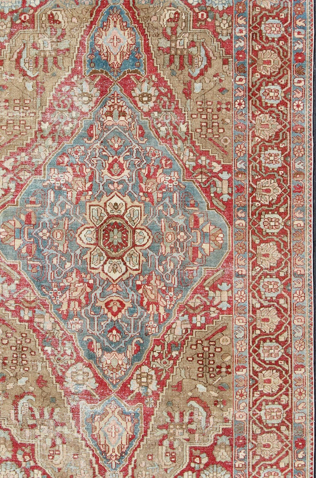 Hand-Knotted Antique Persian Bakhtiari Rug with Layered Floral Medallion Design and Motifs For Sale