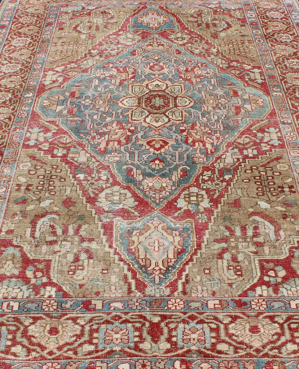 Wool Antique Persian Bakhtiari Rug with Layered Floral Medallion Design and Motifs For Sale