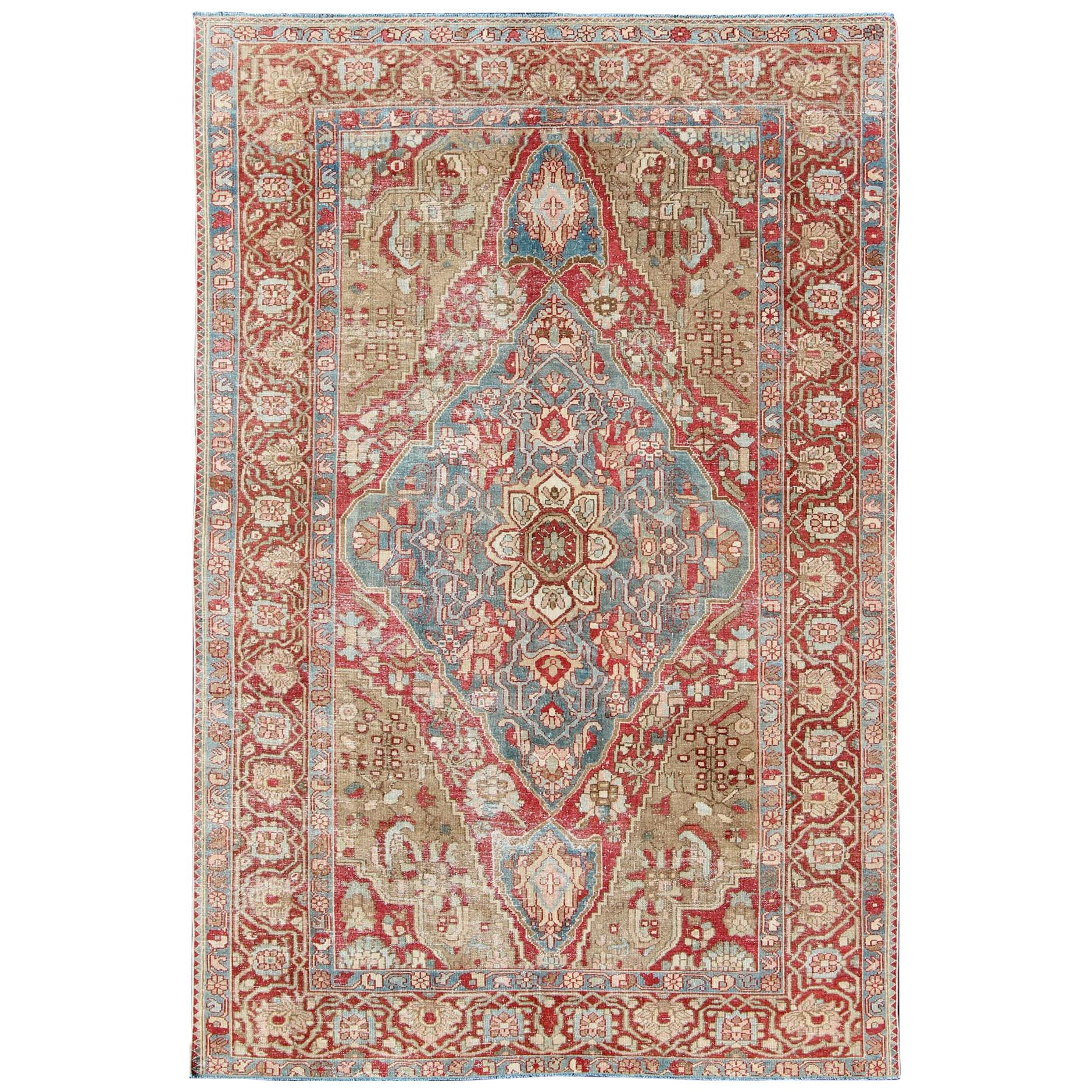 Antique Persian Bakhtiari Rug with Layered Floral Medallion Design and Motifs For Sale