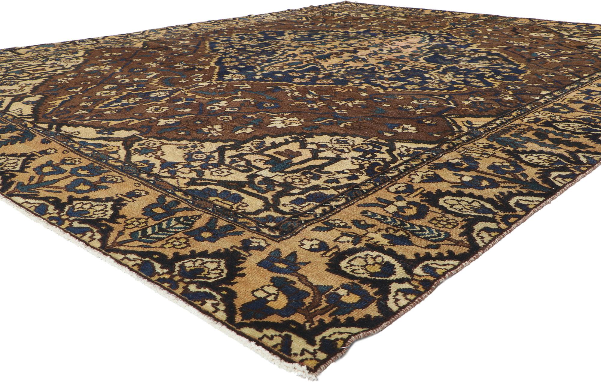 53749 Antique Persian Bakhtiari Rug, 09'04 x 11'11.
​Get ready to fall head over heels for this hand knotted antique Persian Bakhtiari rug! Radiating from the center is a large-scale medallion richly patterned with a beguiling stylized florals and