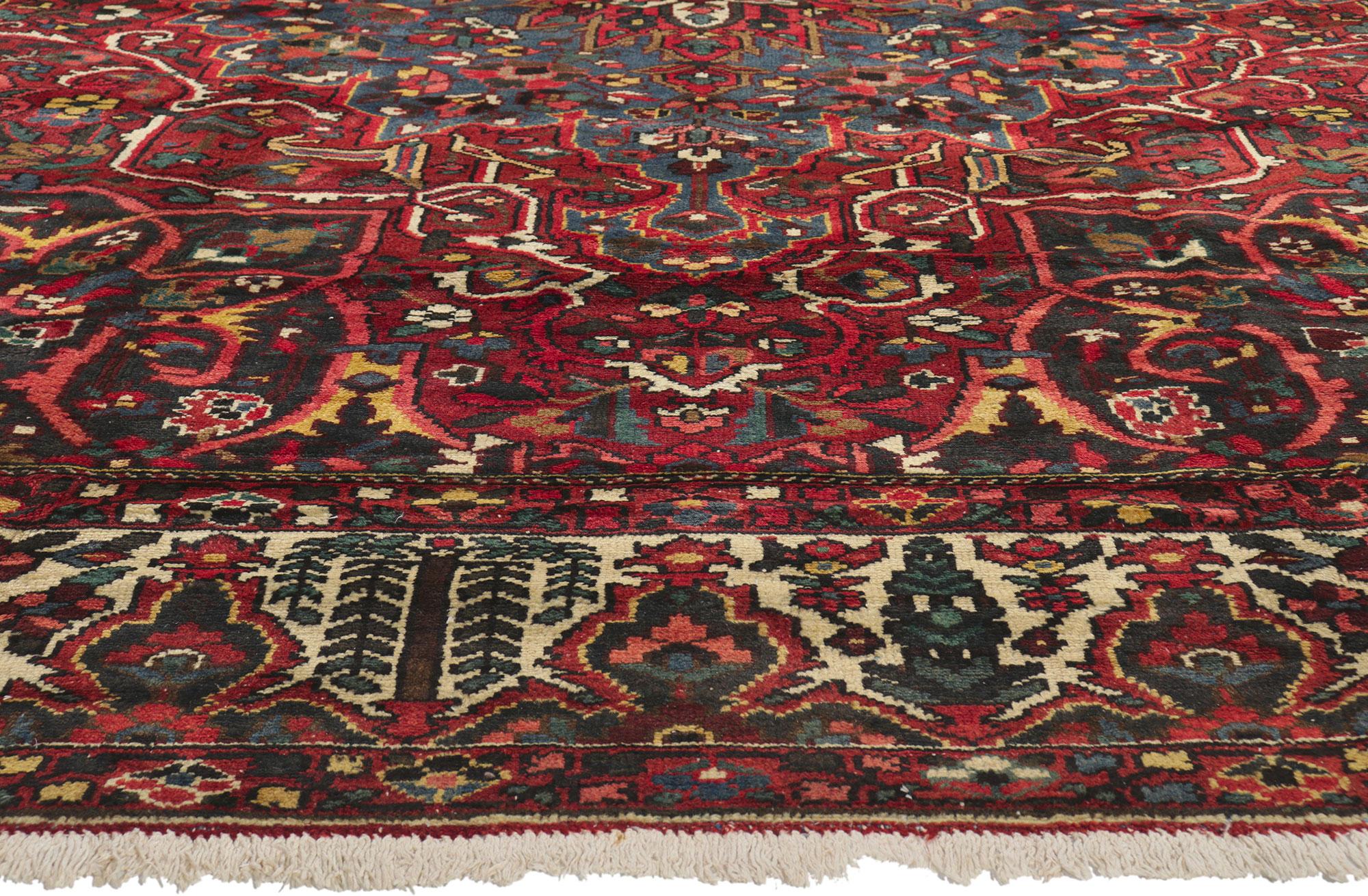 73095 Antique Persian Bakhtiari Rug 10'02 x 11'10. In this masterfully hand-knotted antique Persian Bakhtiari rug, the story of a tribe is written not with ink, but with wool—each knot a verse, each motif a memory. Woven in the heart of the Zagros