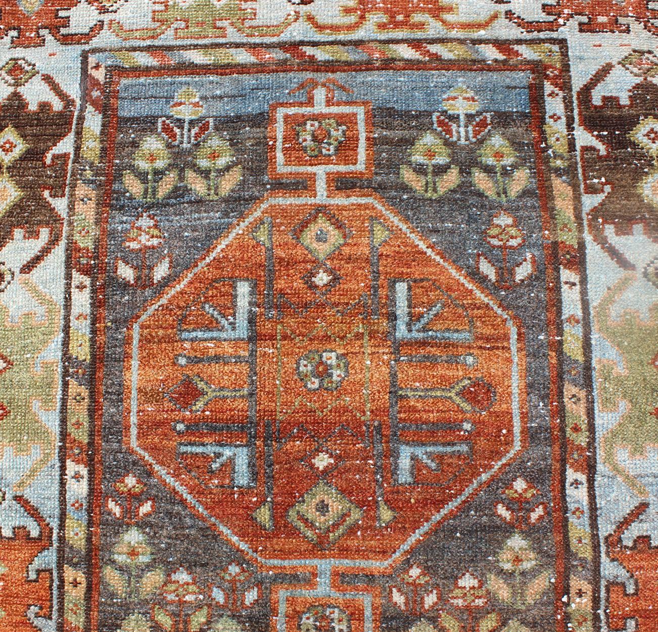 Wool Antique Persian Bakhtiari Runner in Colorful Geometric Medallion For Sale