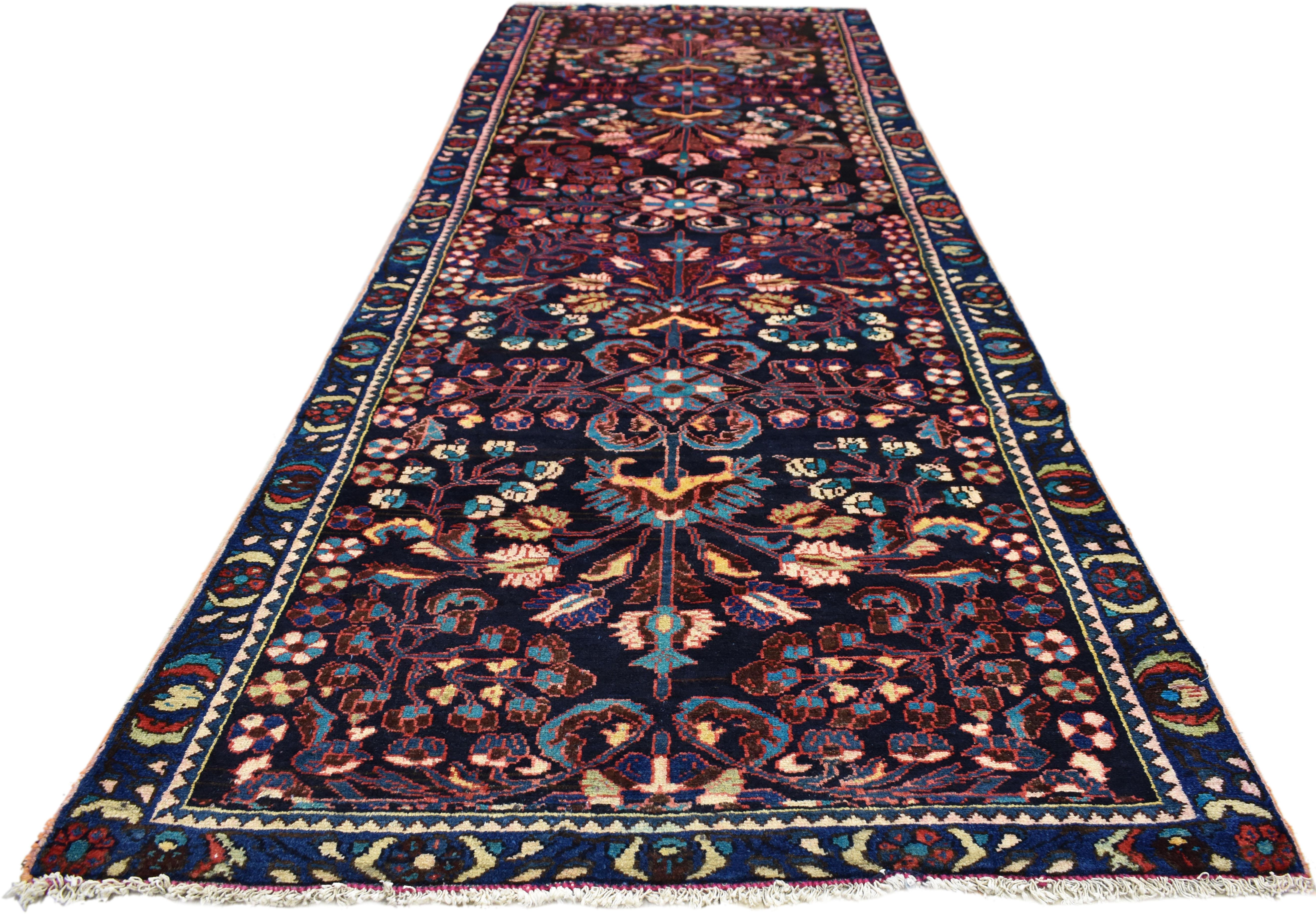 75289 Antique Persian Bakhtiari Runner with Rich Jewel-Tones, Hallway Runner. Impressive in style and rich jewel-tones, this antique Persian Bakhtiari runner with modern style features an all-over botanical design a navy blue field surrounded by an