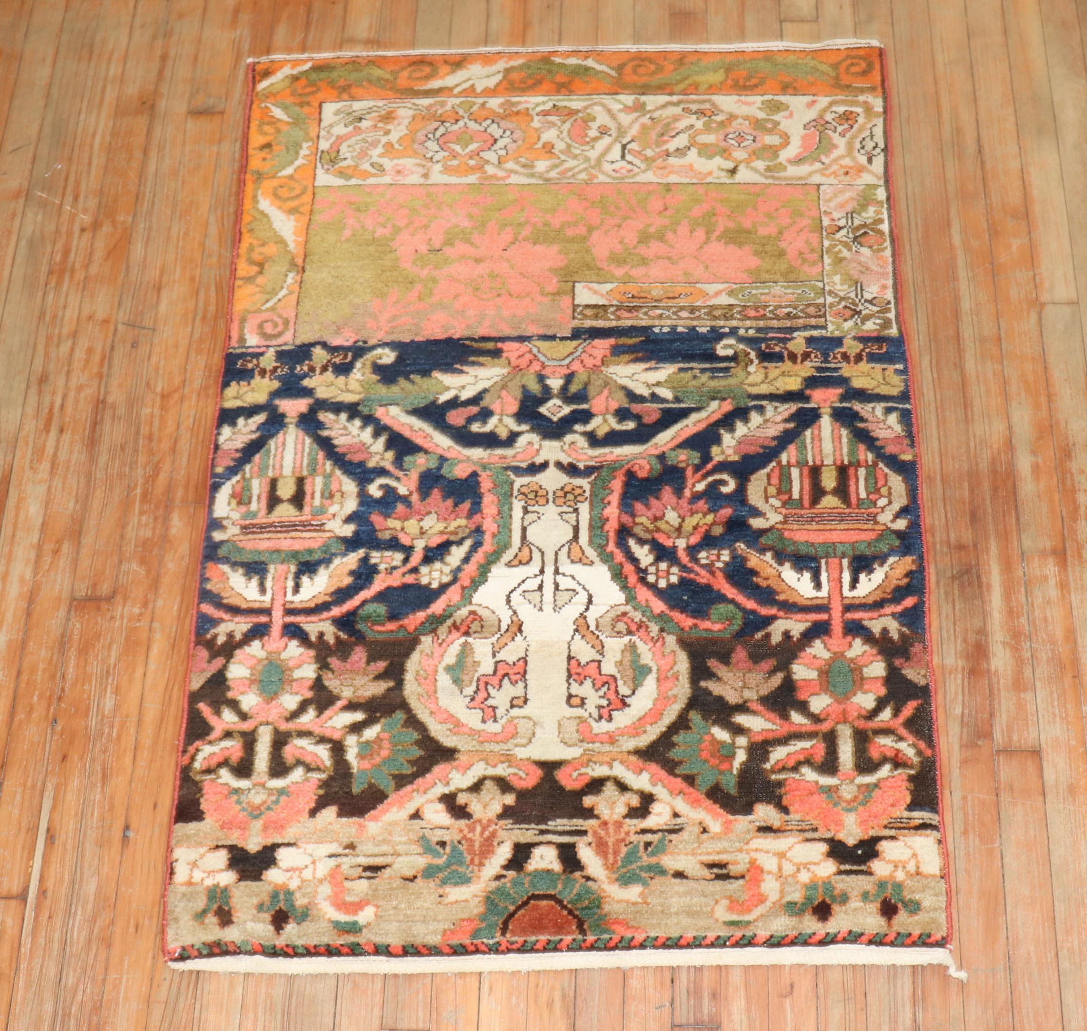 A rare and colorful Persian Bakhtiari sampler (wagireh) rug. 

Measures: 3'3'' x 4'8''.