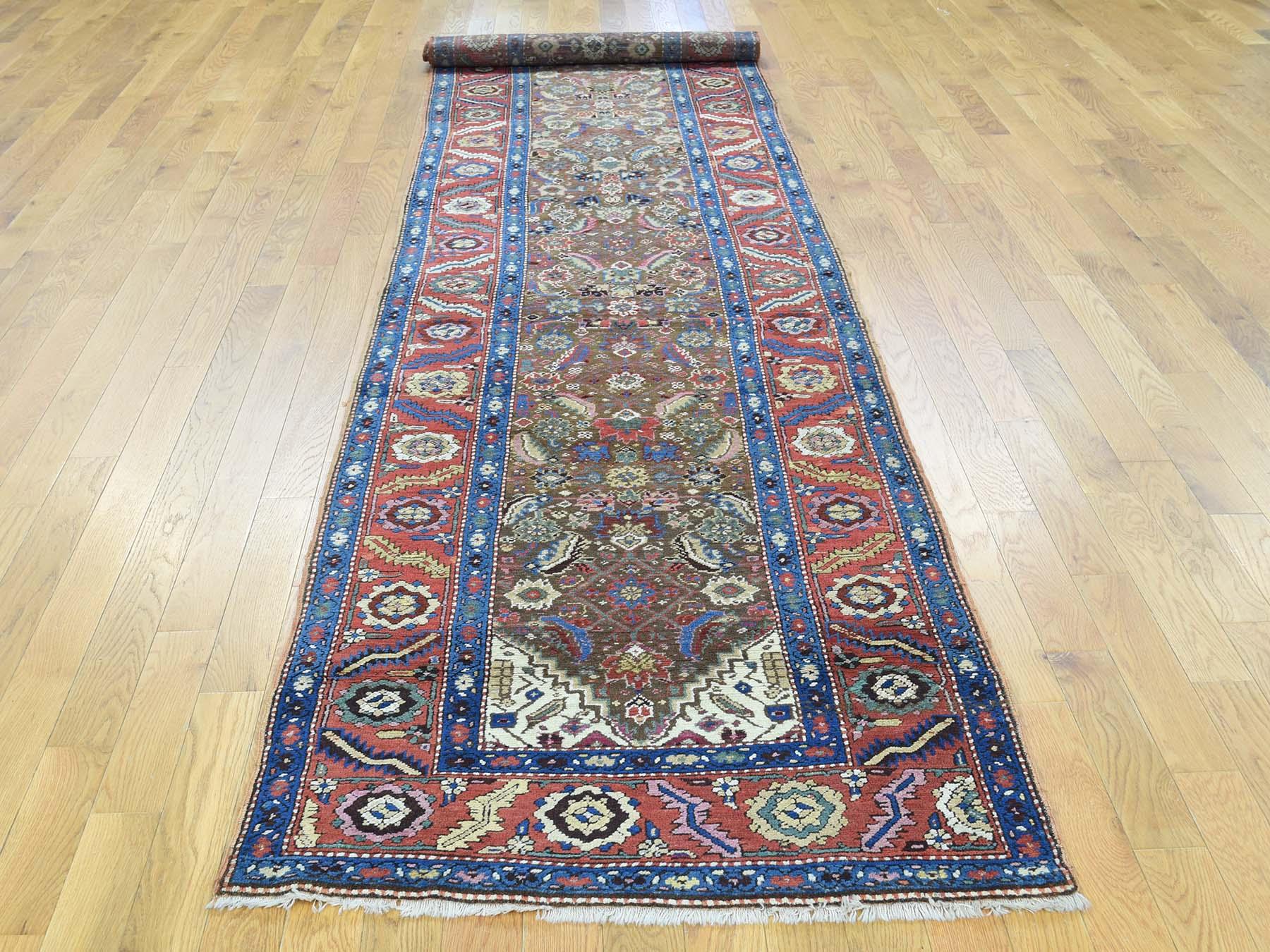This is a genuine hand knotted oriental rug. It is not hand tufted or machine made rug. Our entire inventory is made of either hand knotted or handwoven rugs.

Start a new room with this superb antique carpet. This handcrafted Persian Bakshaish