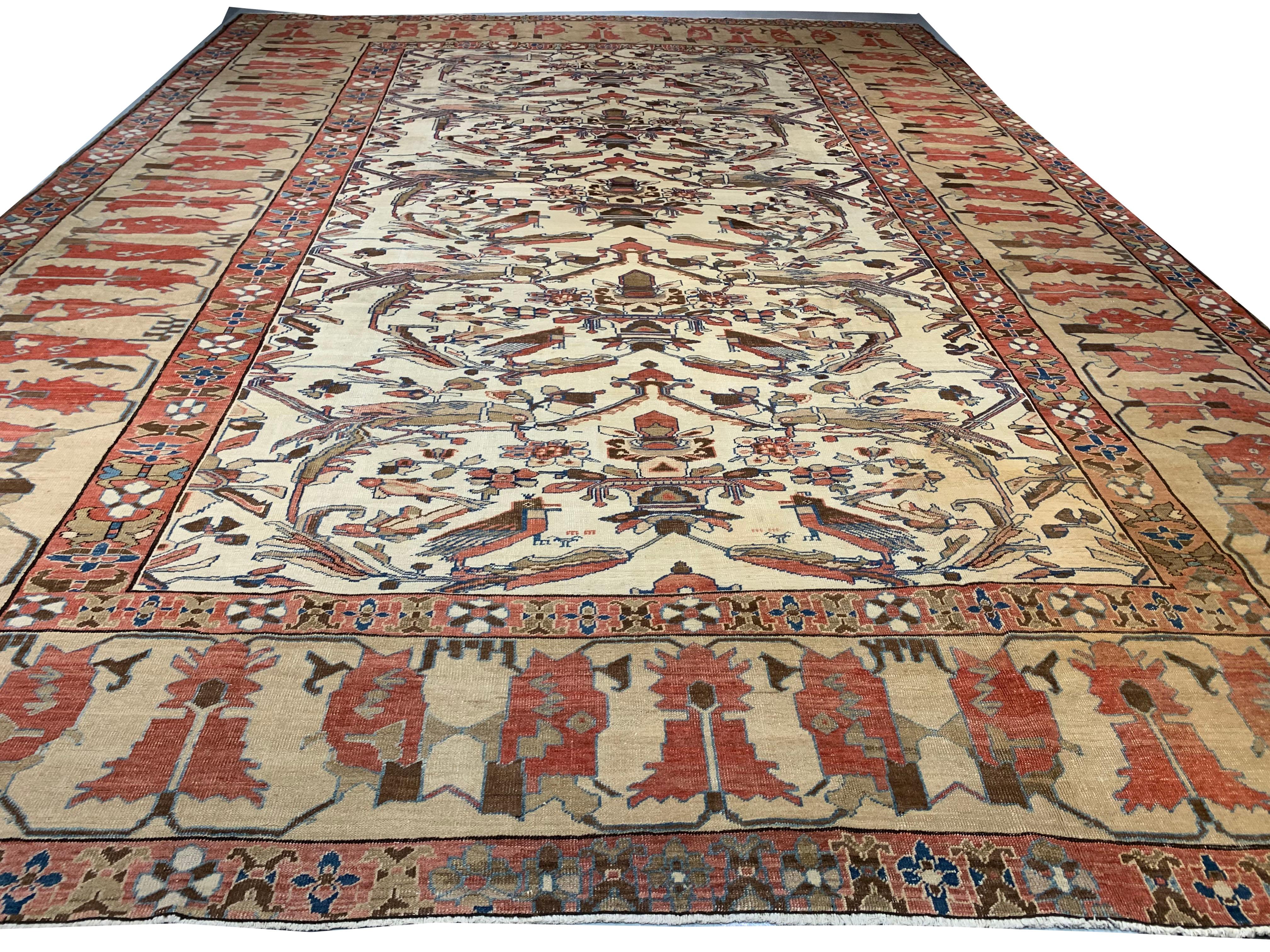 Antique Persian Bakshaish rug, 13' x 17'6. This is a truly unique, extremely imaginative NW Persian rustic carpet with a sky/land/water iconography. The two species of birds, larger parrots and smaller bulbuls (nightingales), refer to the sky and