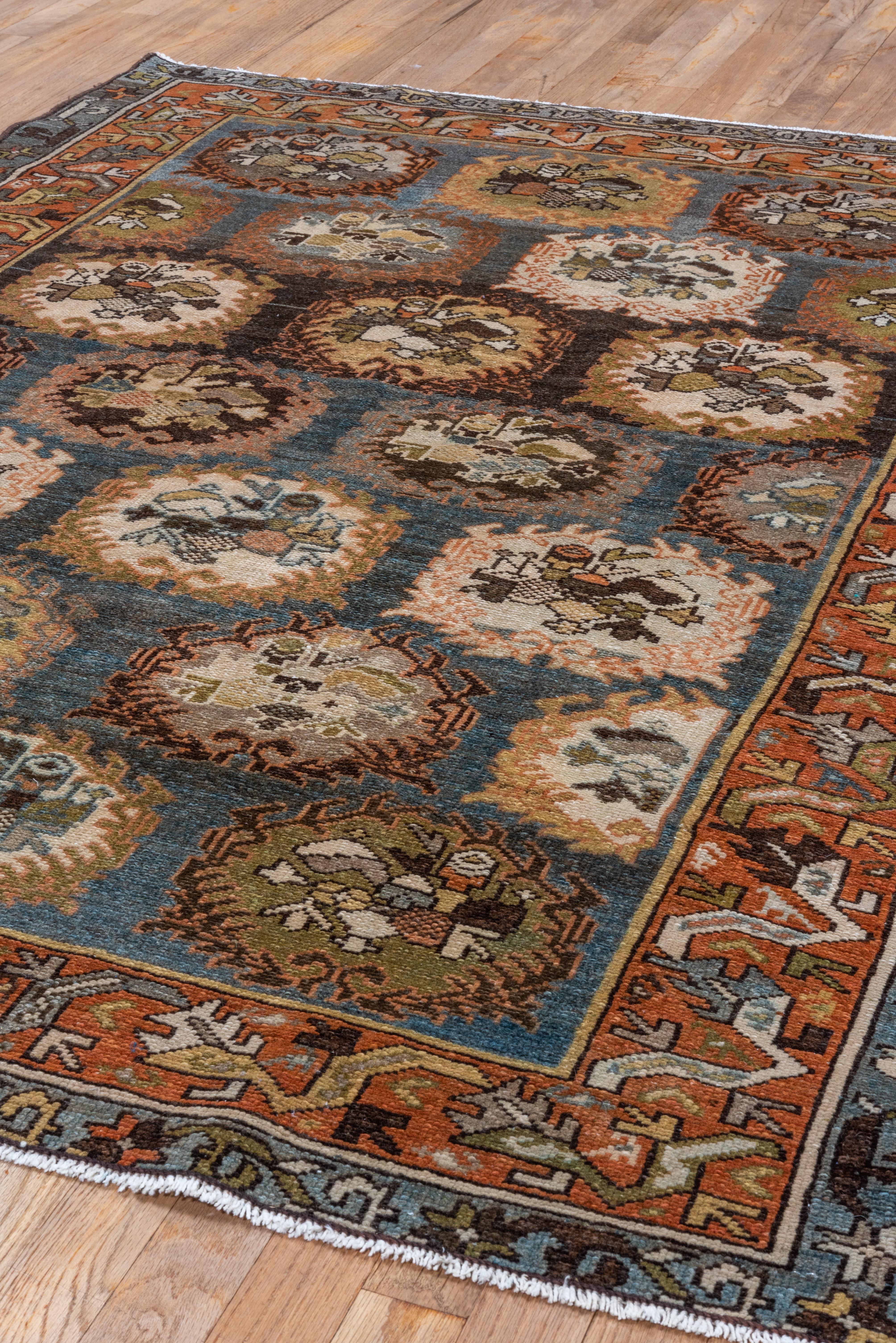 Wool Antique Persian Baktiary Scatter Rug, Unique Motifs, Blue Field and Rust Border For Sale