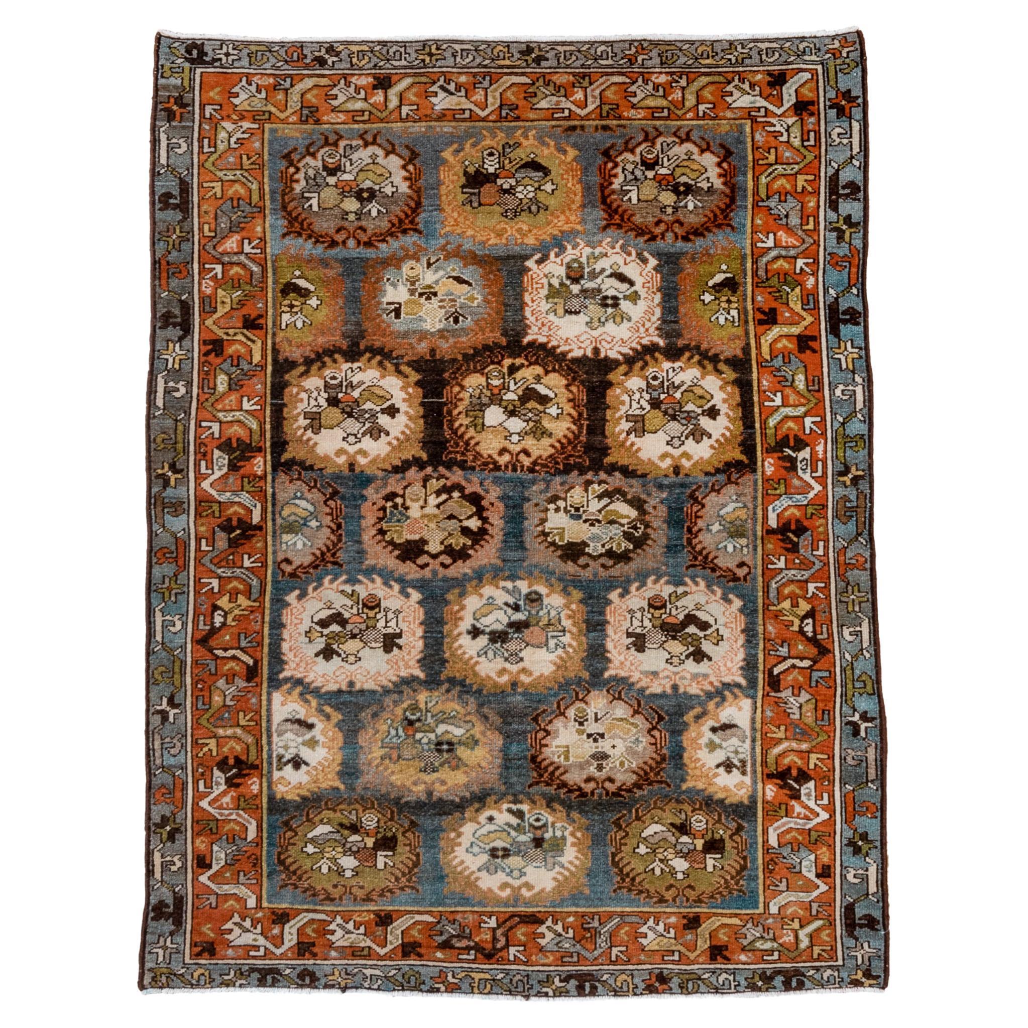 Antique Persian Baktiary Scatter Rug, Unique Motifs, Blue Field and Rust Border For Sale