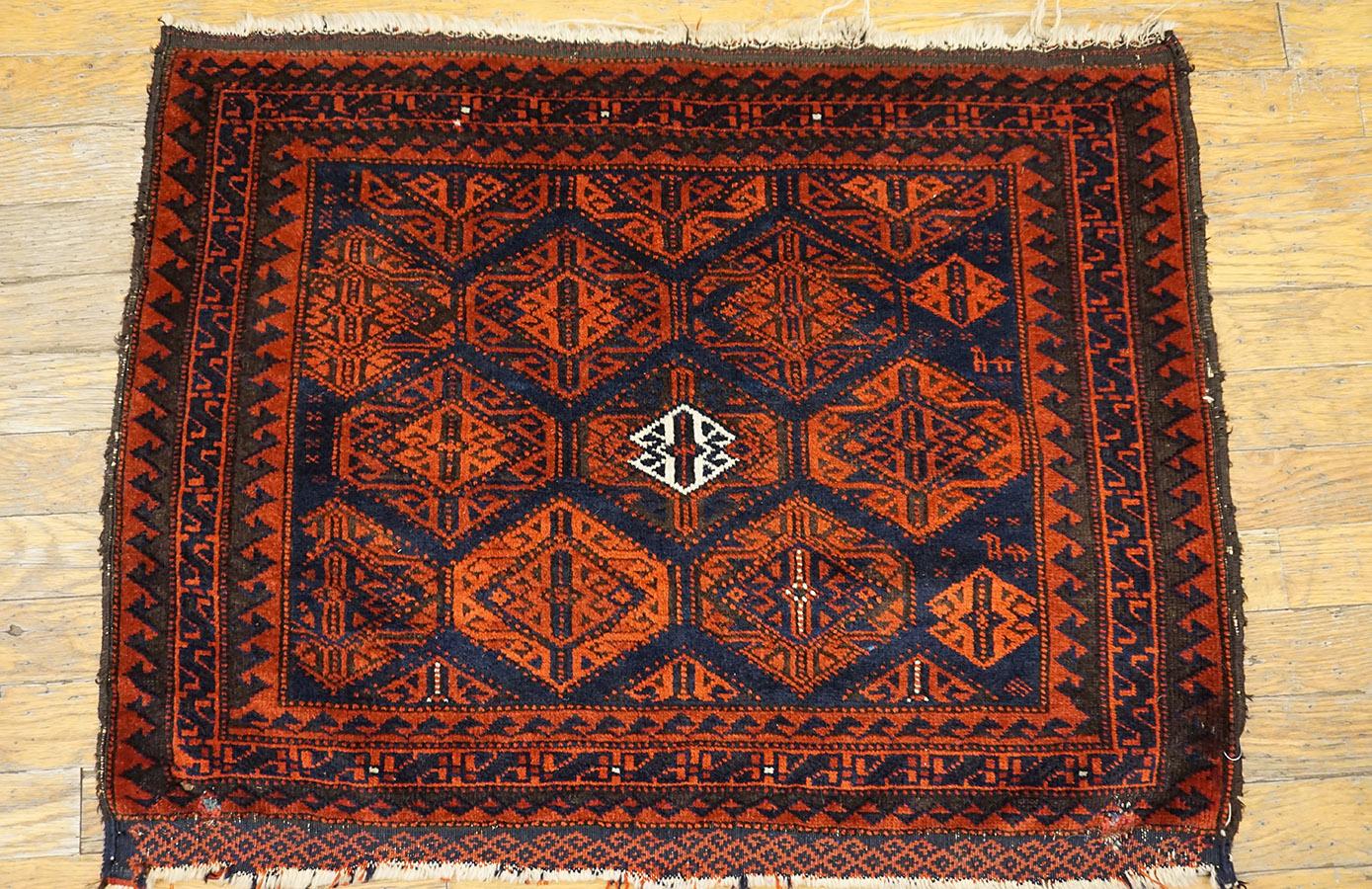 Antique Persian Balouch rug, Size: 2' 0'' x 2' 6''.