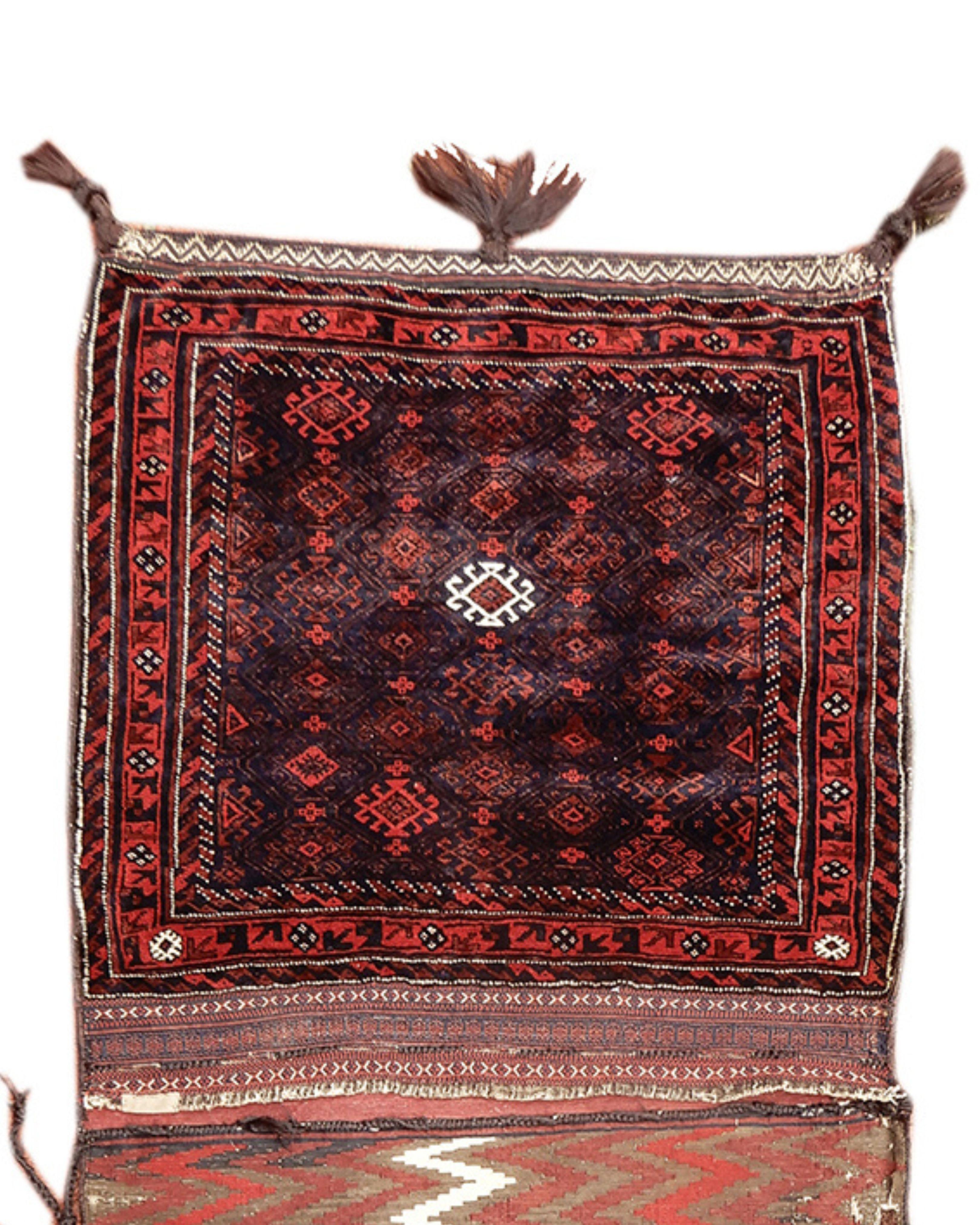 Antique Persian Baluch Khorjin Rug Saddle Bag, 19th Century (4th Quarter)

This exceptionally fine Baluch double saddle bag set, or ‘khorjin,’ was woven in the Northeast Persian province of Khorosan. Complete sets of Baluch khorjin of this age are