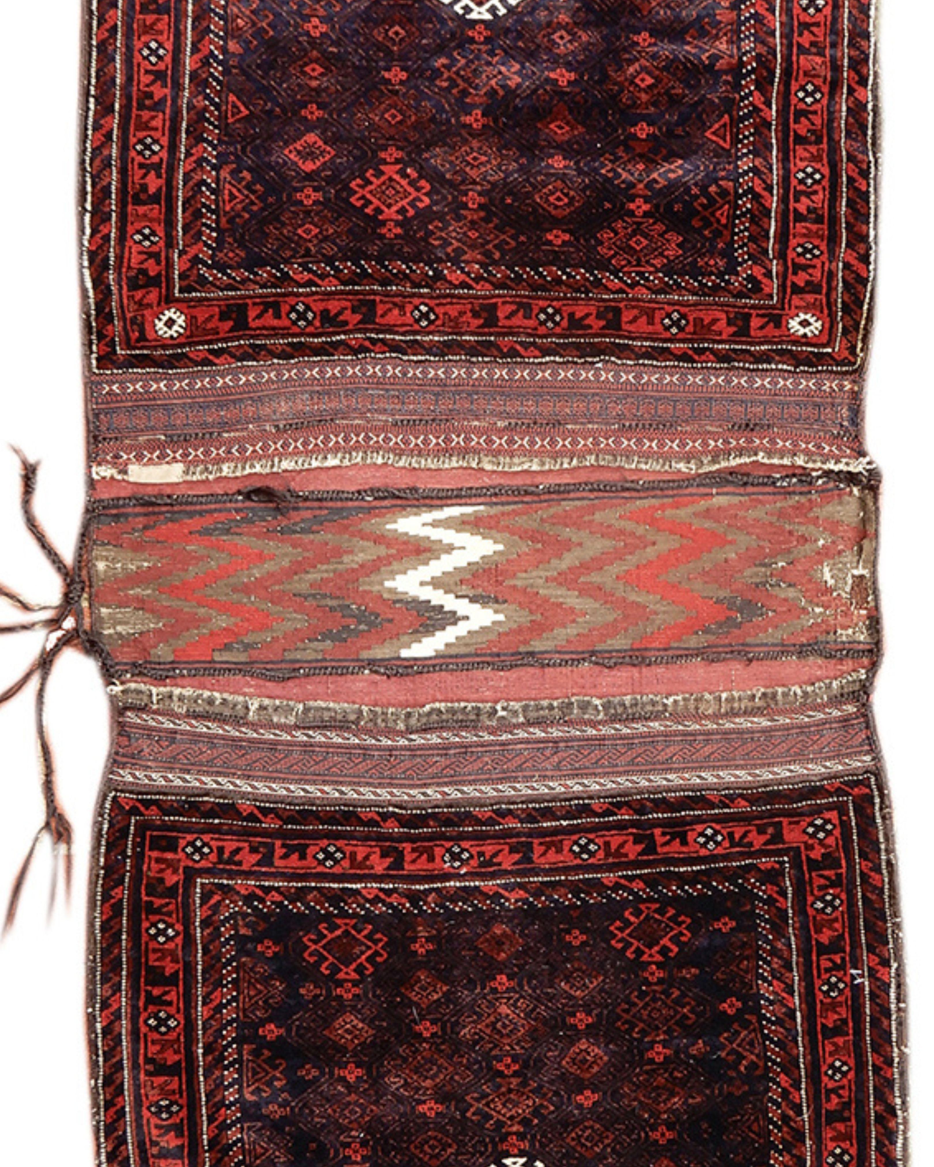 Hand-Knotted Antique Persian Baluch Khorjin Saddle Bag, 19th Century For Sale
