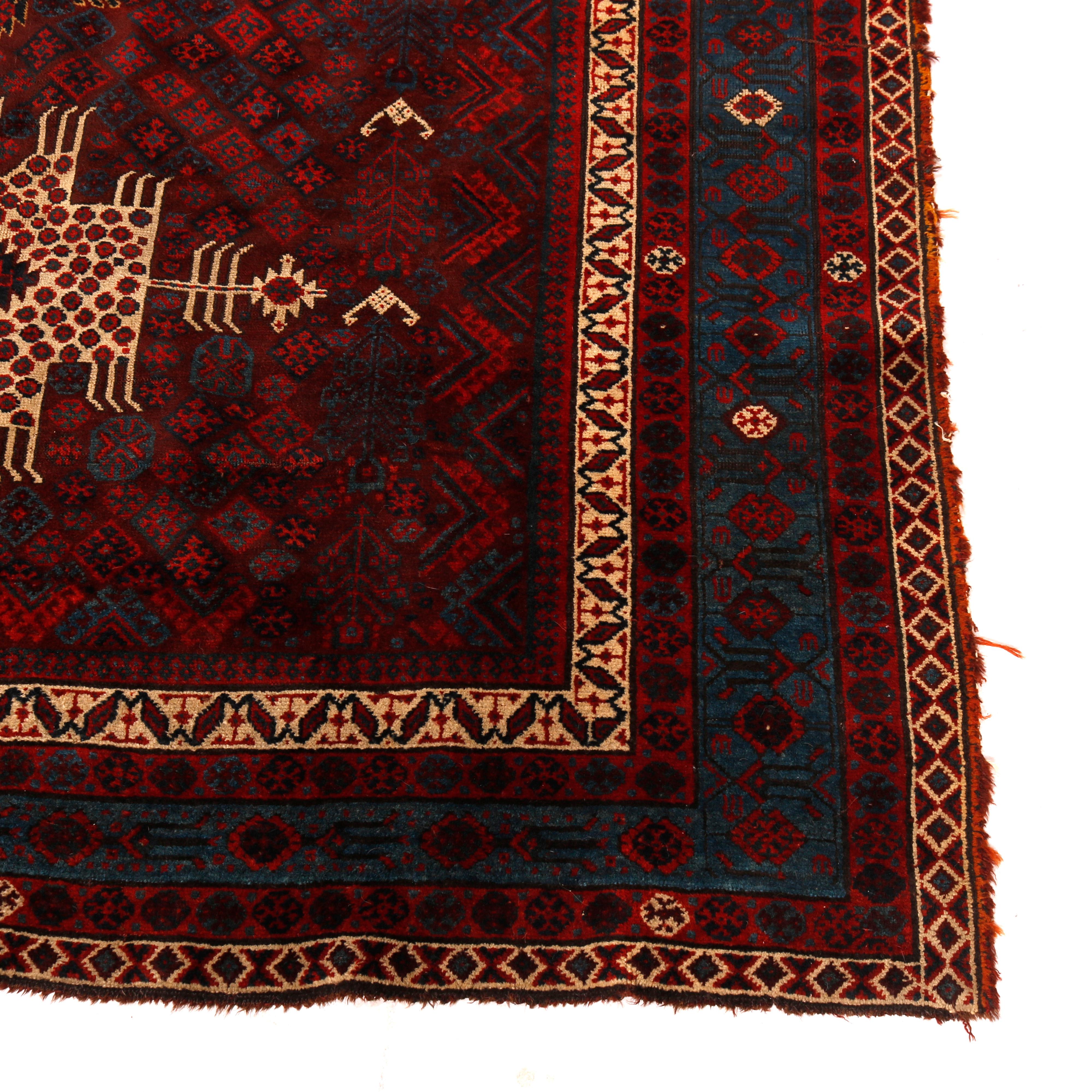 An antique Persian Baluch oriental rug offers wool construction with triple medallions on ground having diamond pattern with stylized floral and foliate elements, c1910

Measures - 95.5'' L x 68.5'' W x .5'' D.

Catalogue Note: Ask about DISCOUNTED