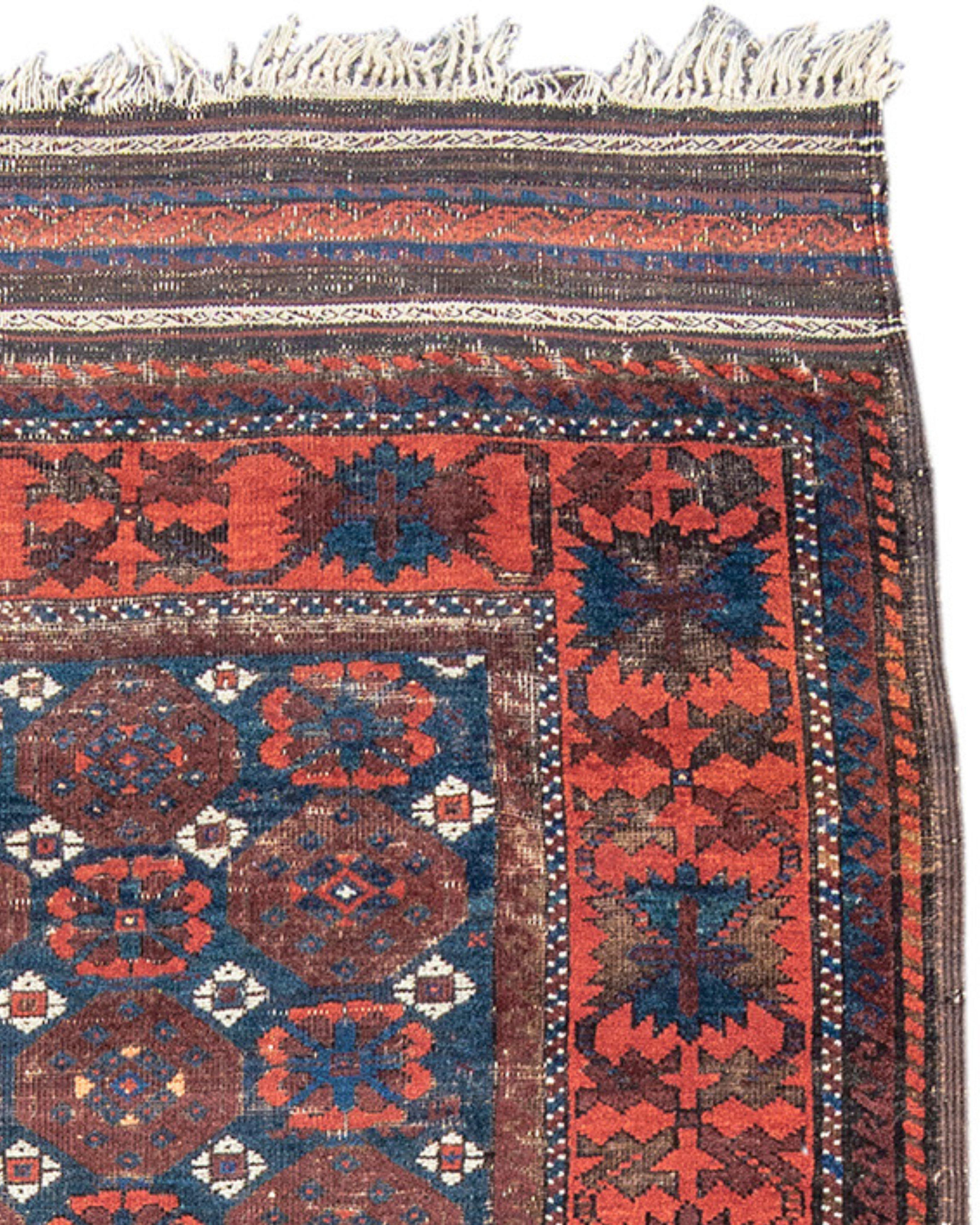 Antique Persian Baluch Rug, Late 19th Century

With a classic design type, this rug comes from northeast Iran. Known as a ‘mina khani’ design, it features stylized flower heads with smaller flowers in white arranged on an indigo blue field. The