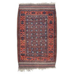 Ancien tapis persan Baluch, fin du 19e siècle
