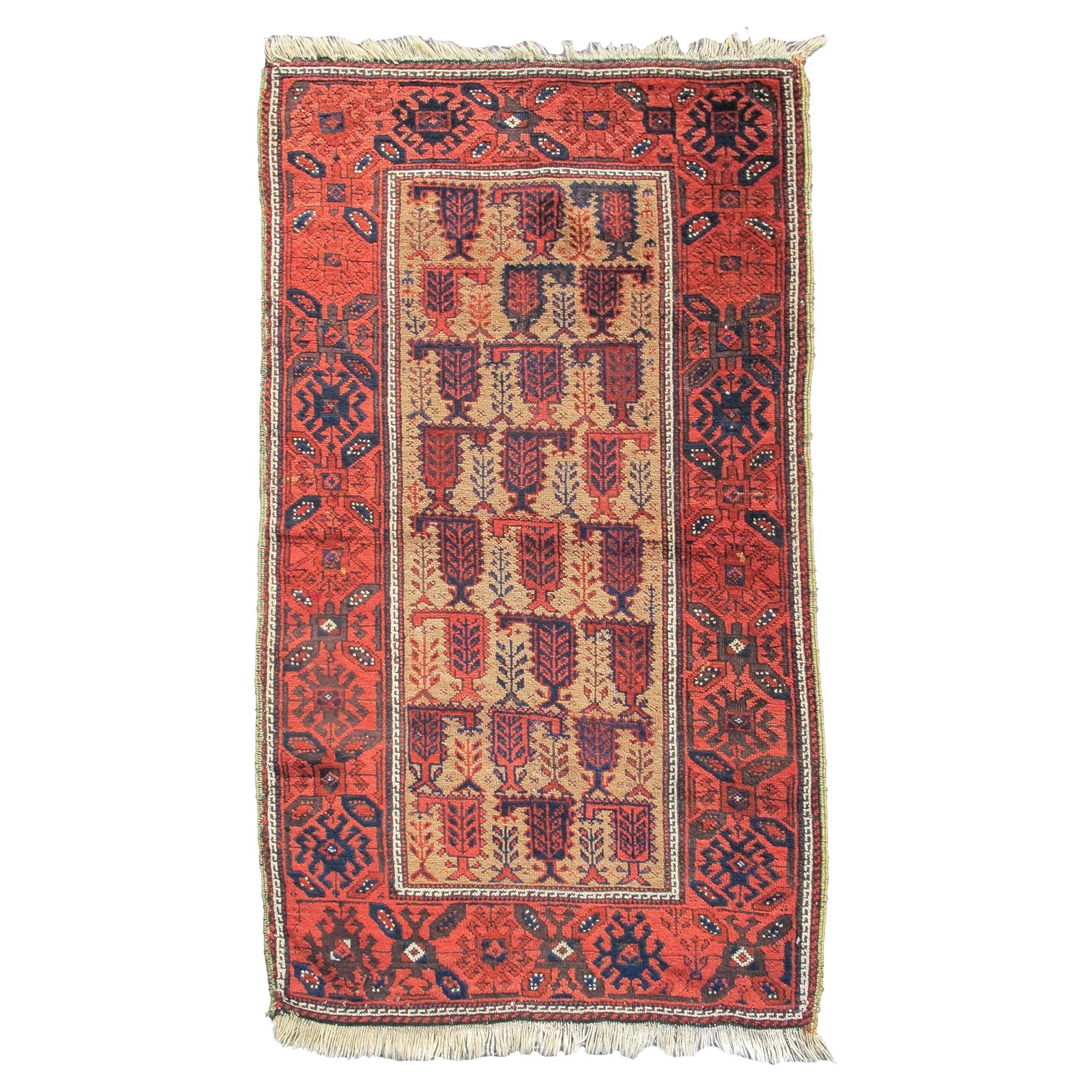 Ancien tapis persan Baluch, fin du 19e siècle en vente