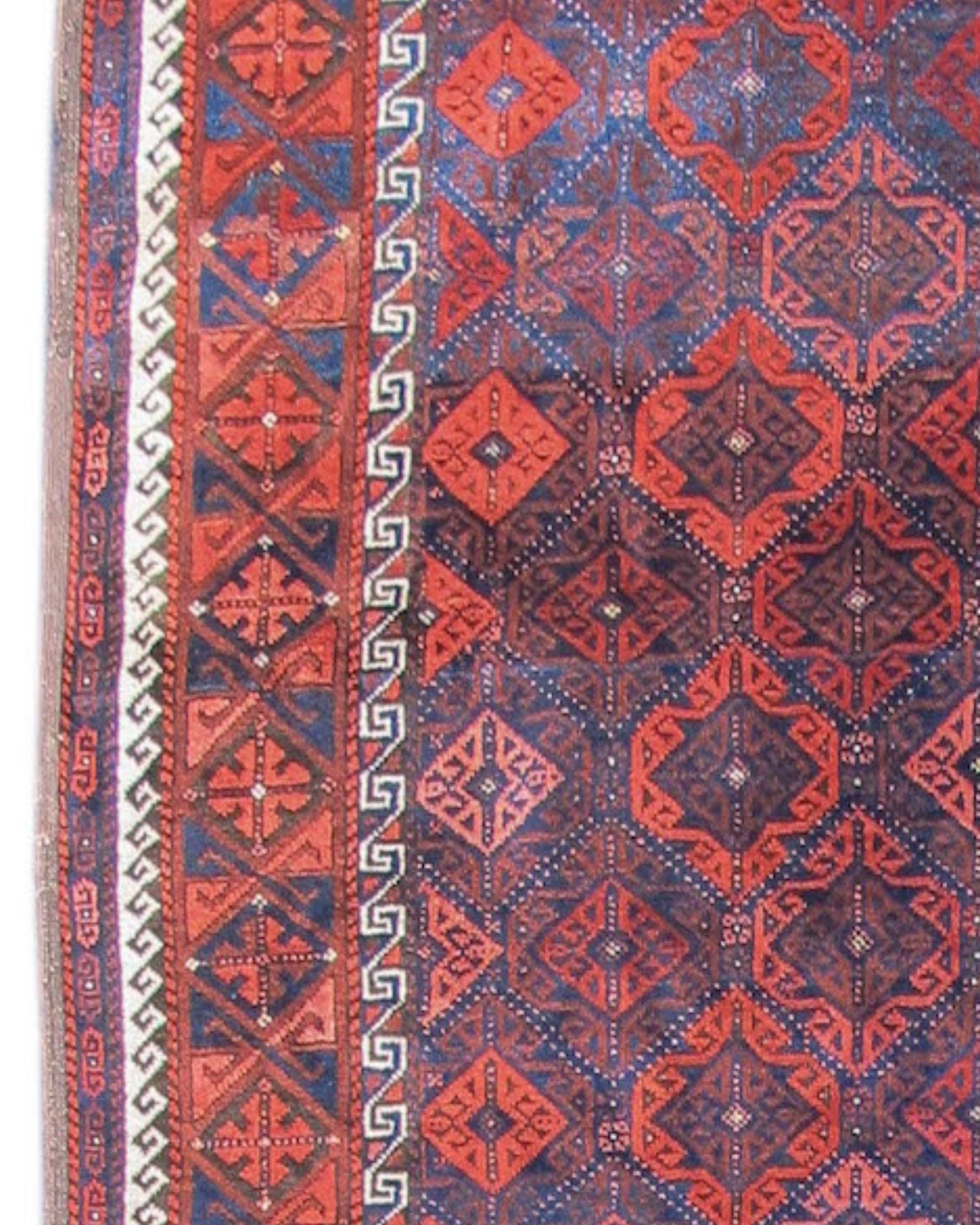 Antique Persian Baluch Runner Rug, Late 19th Century

This majestic Baluch rug was woven in the north east Persian province of Khorosan. With its fiery tone on tone reds and modulated polychromatic blues, it most likely hails from the Torbat region,