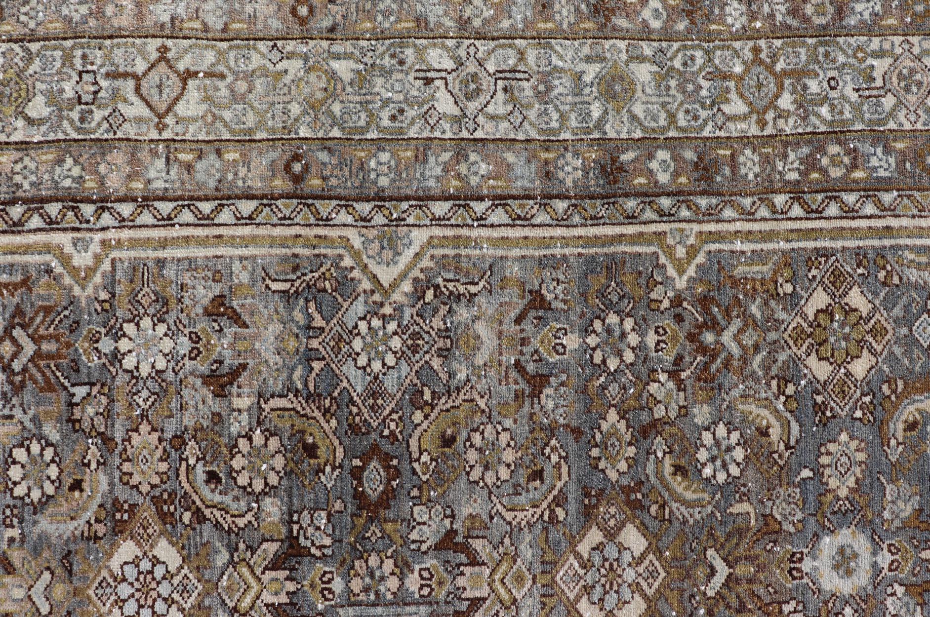 Antique Persian Bibikabad carpet with steal blue, charcoal, green, and brown. Rug W22-0108, country of origin / type: Iran / Bibikabad, circa 1920 with a rare size.

Measures: 6'2 x 9'2 

With a rare size, this antique Persian Bibikabad carpet, from