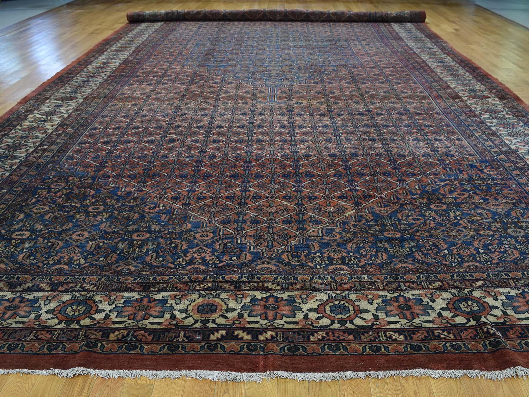 This is a genuine hand knotted oriental rug. It is not hand tufted or machine made rug. Our entire inventory is made of either hand knotted or handwoven rugs.

Adorn your house style with this splendid antique carpet. This handcrafted Persian