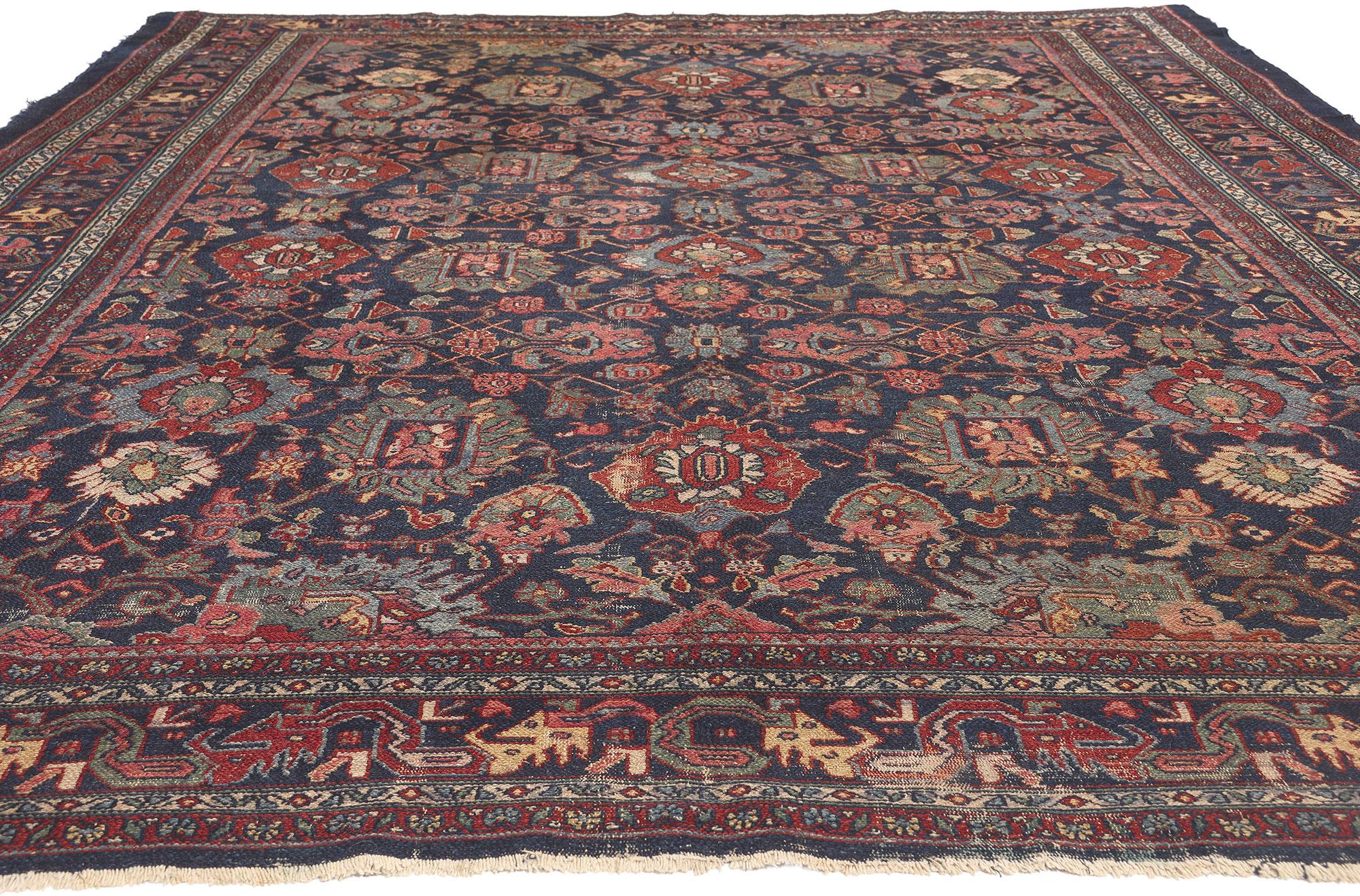 Malayer Antique Persian Bibikabad Rug, Traditional Elegance Meets Rustic Sensibility For Sale