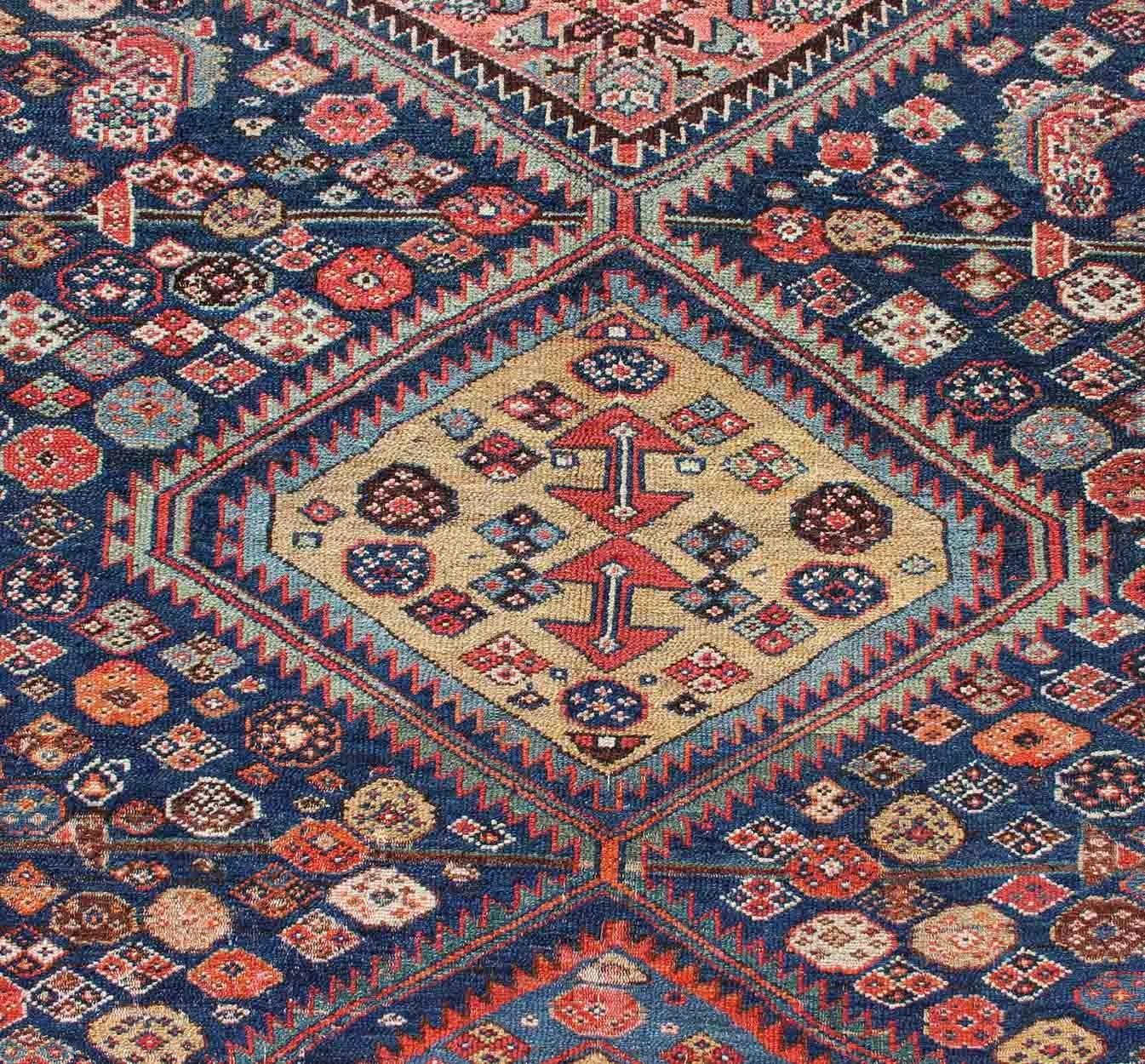 Late 19th Century Antique Persian Bibikabad Rug with Diamond Medallions in Blue Background For Sale