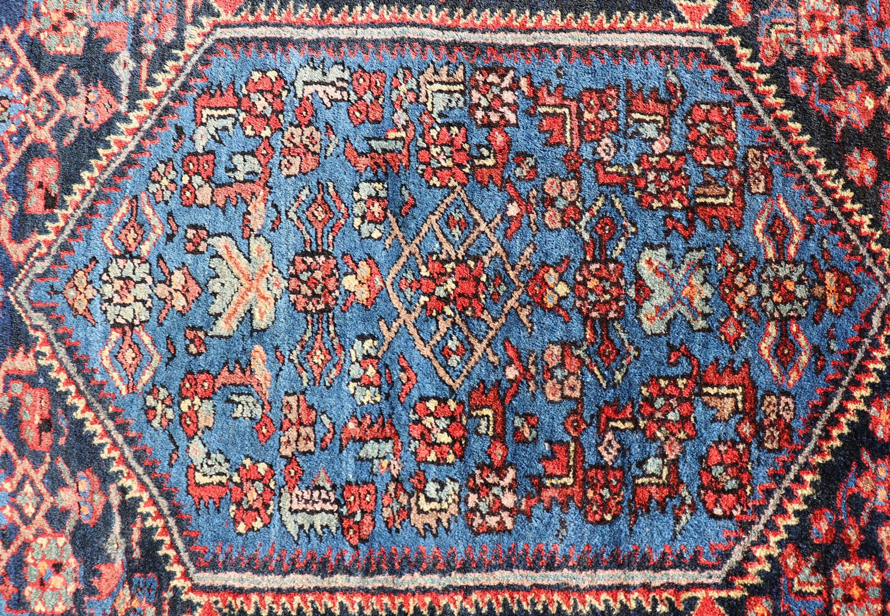 20th Century Antique Persian Bidjar Carpet with Variety of Blue Colors, Red, and Salmon For Sale