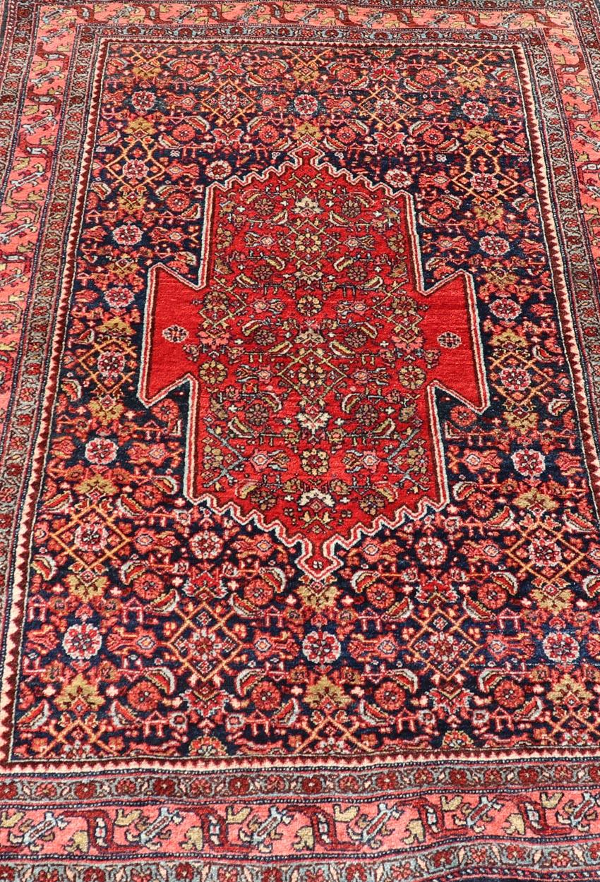 Tribal Antique Persian Bidjar Medallion Designed Carpet with Blue's, Red, and Pink  For Sale