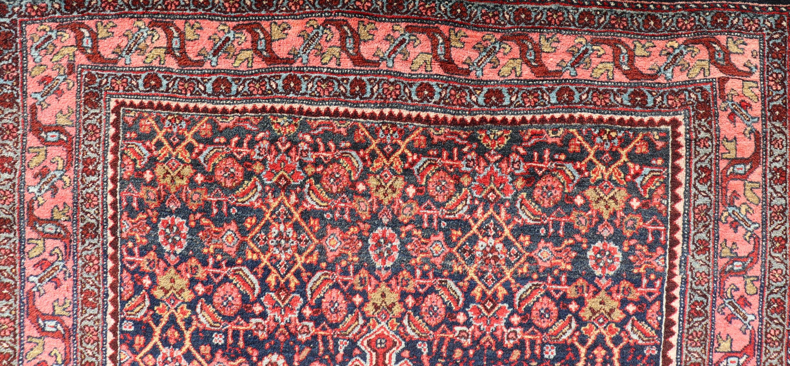 20th Century Antique Persian Bidjar Medallion Designed Carpet with Blue's, Red, and Pink  For Sale