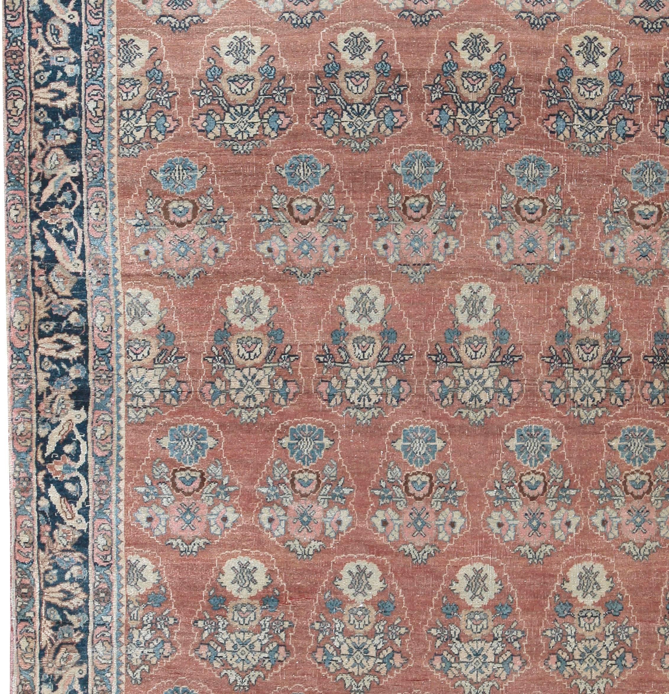 Antique Persian Bidjar rug carpet, circa 1900. This Bidjar rug, circa 1900 has a repeating floral pattern enclosed by a deep blue border. A real delight to the eye. Size: 3'7 x 5'3.
