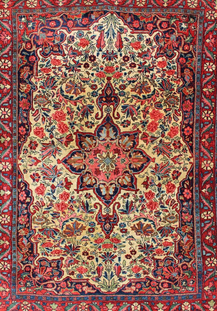 Tabriz Antique Persian Medallion Bidjar Colorful Rug In Ivory, Navy Blue and Red For Sale