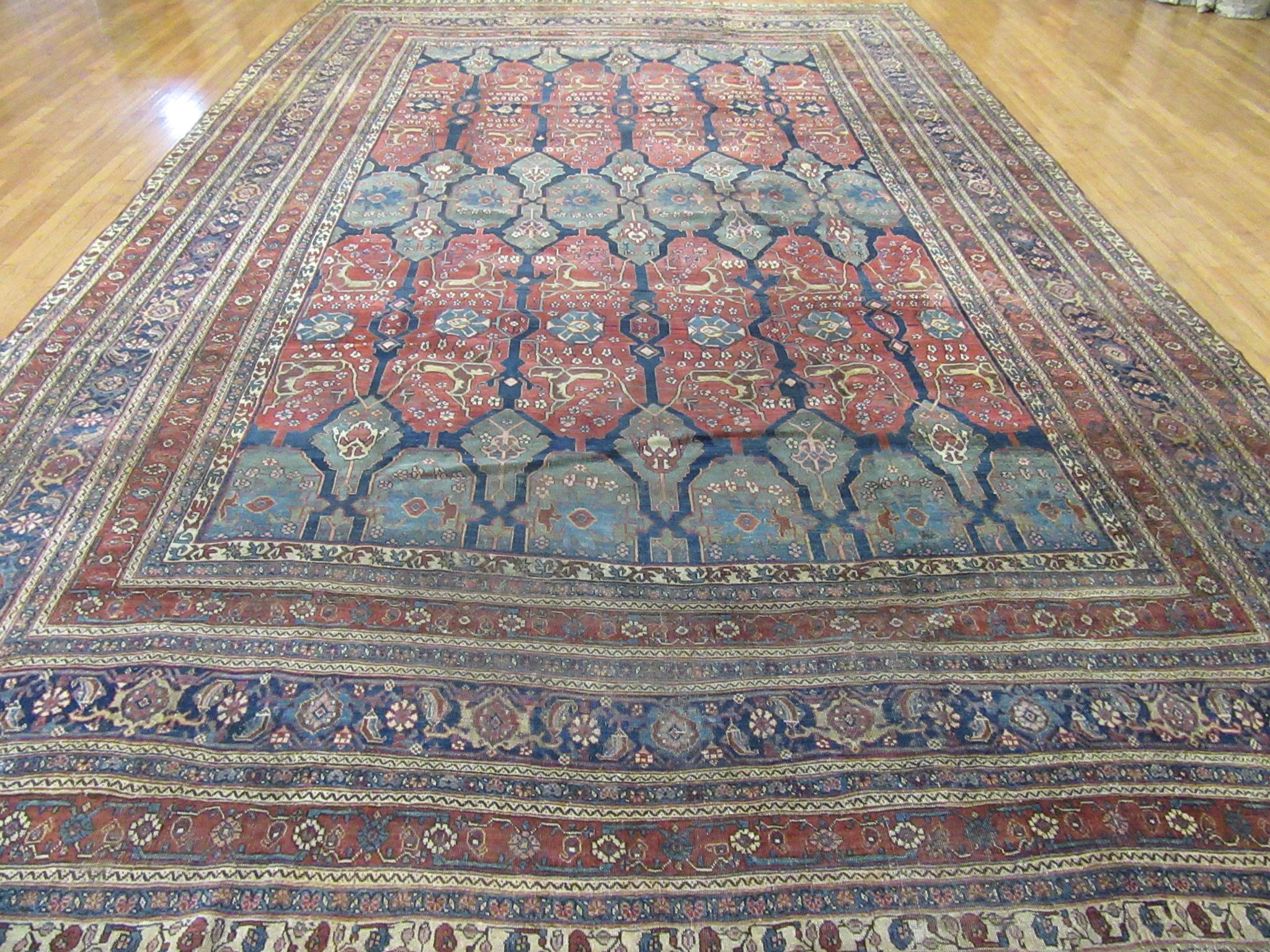 This is a rare late 19th century antique hand-knotted infamous Persian Halwaee Bidjar rug. It has a very unique all-over pattern made with 100% wool and all natural dyes. The rug is in great shape and measures 11' 3'' x 18 '.