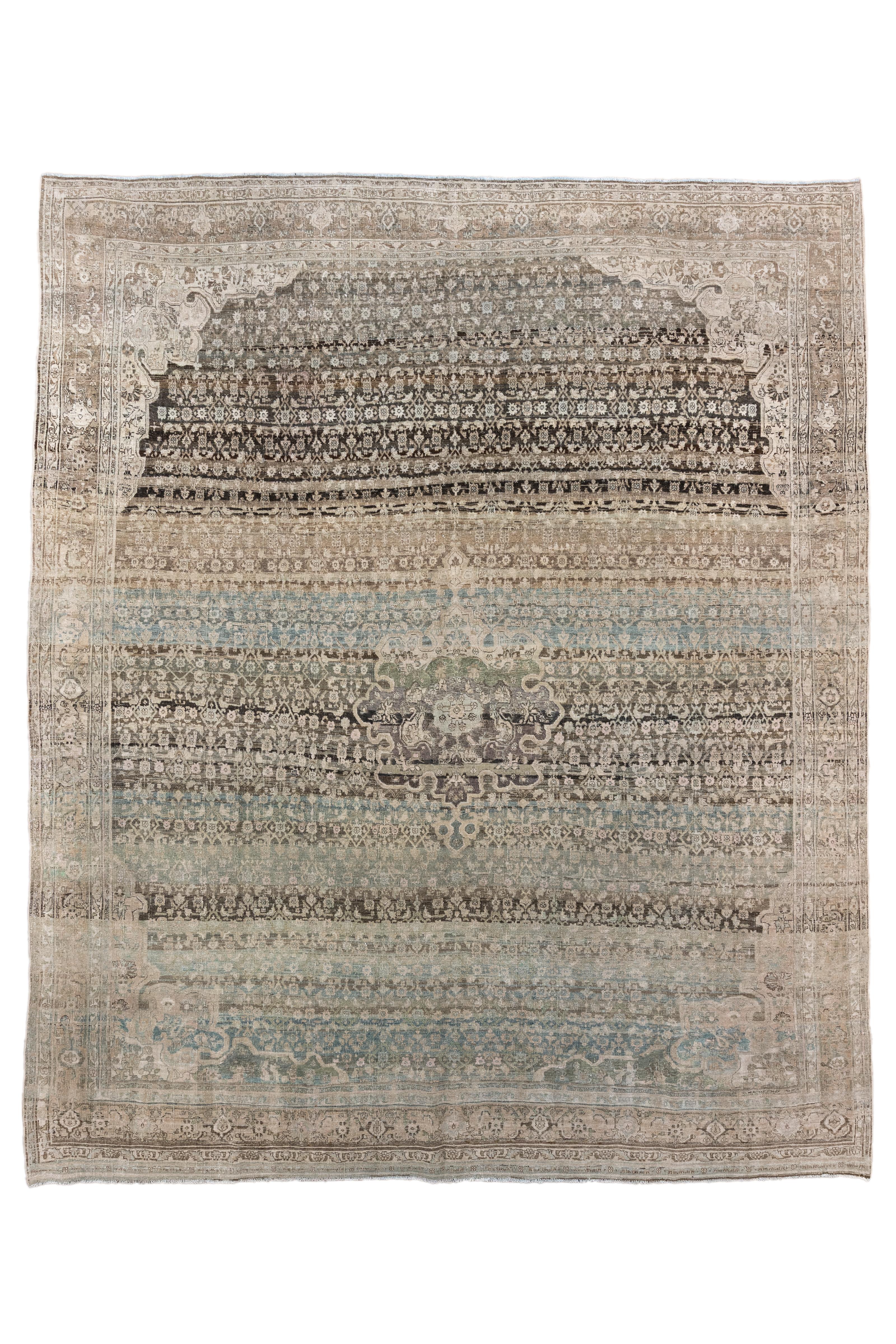A true collector’s piece, this antique Bidjar rug was handwoven circa 1900 and exhibits the powerful structural integrity and artistic finesse the region is famed for. Known as the “Iron Rugs of Persia” due to their dense weave and durability, this
