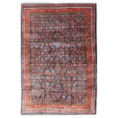 Antigua alfombra persa bidjar con diseño integral en rojo y azul 4'9 x 7'2