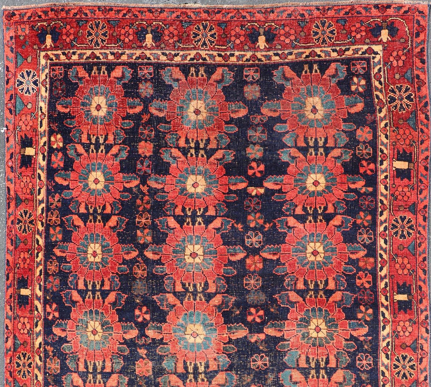 Wool Antique Persian Bidjar Rug with All-Over Floral Motifs in Red and Blue For Sale