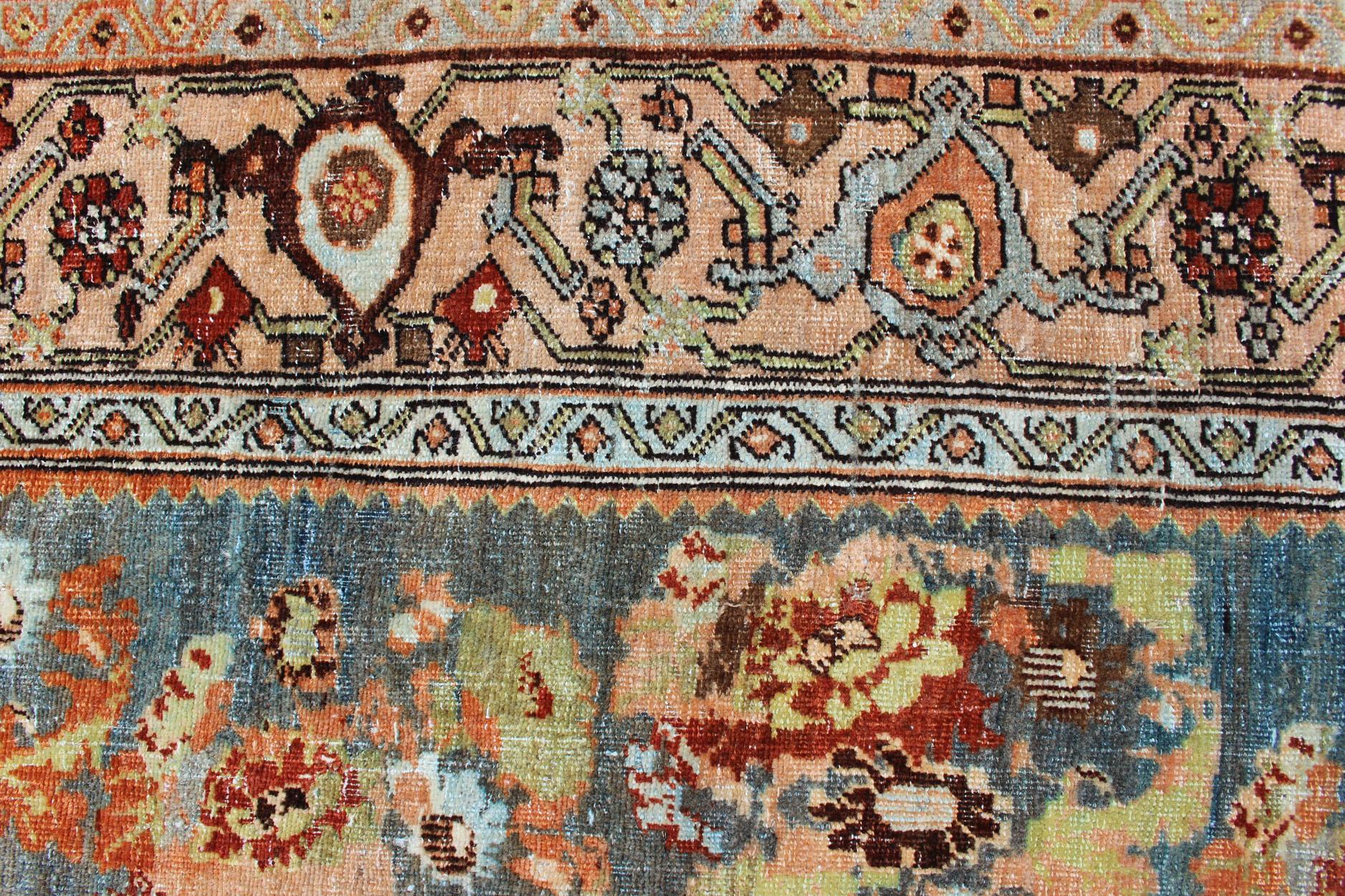 Wool Antique Persian Bidjar Rug with Blossoming Floral Design in Blue and Red For Sale