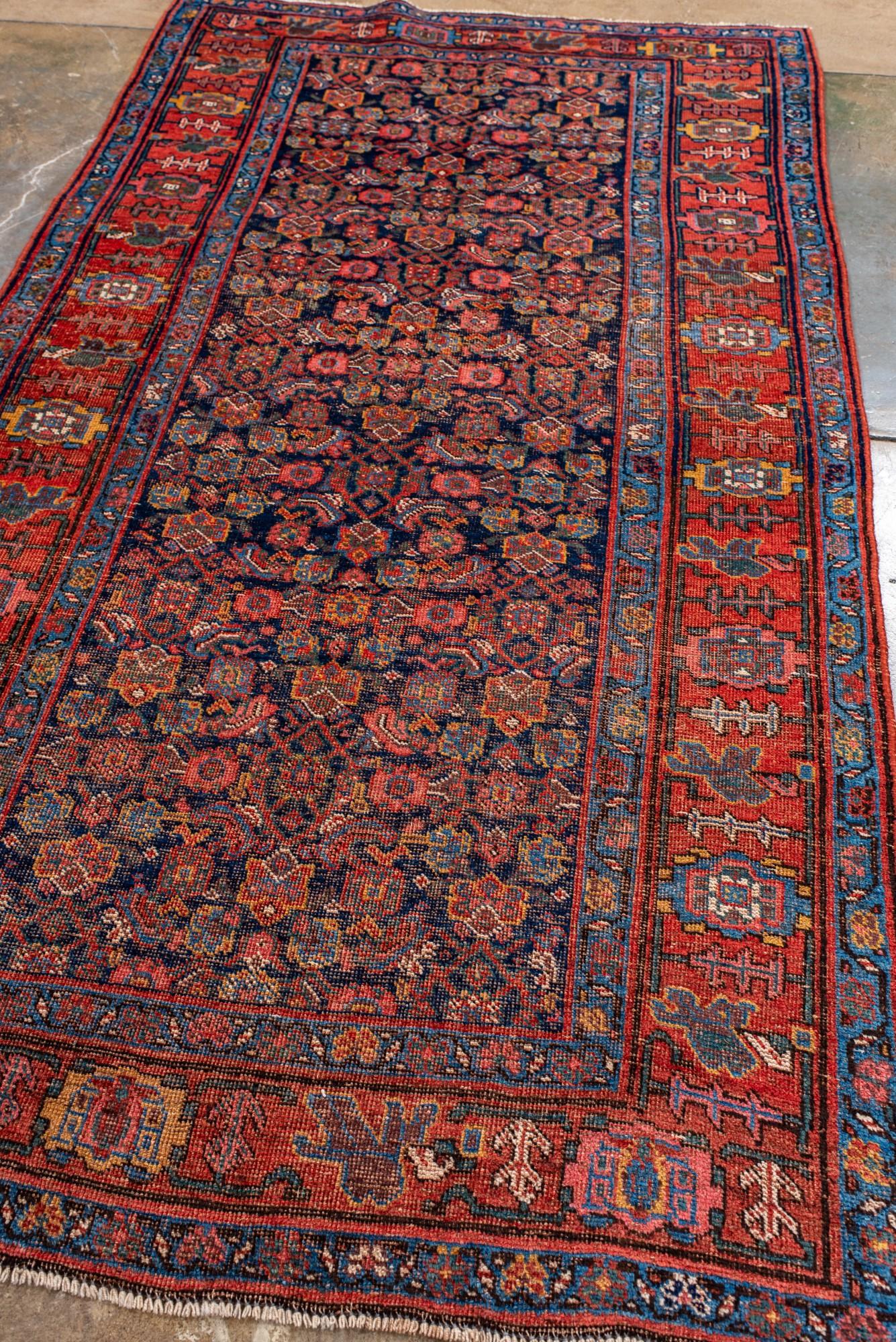 Perse Antique Persian Bidjar Rug with Dense Floral Field. en vente