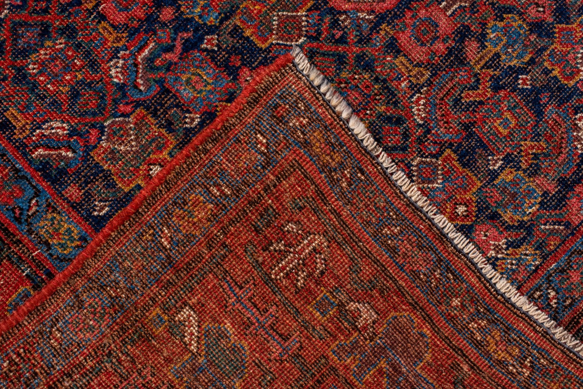 20ième siècle Antique Persian Bidjar Rug with Dense Floral Field. en vente