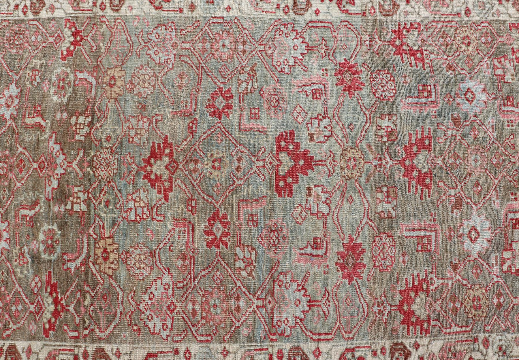 Herati design distressed Bidjar antique Persian rug in a variety of green, taupe green background and soft red border , rug EMB-9542-P13037-05, country of origin / type: Iran / Bidjar, circa 1900

This magnificent Bidjar with an exquisite,