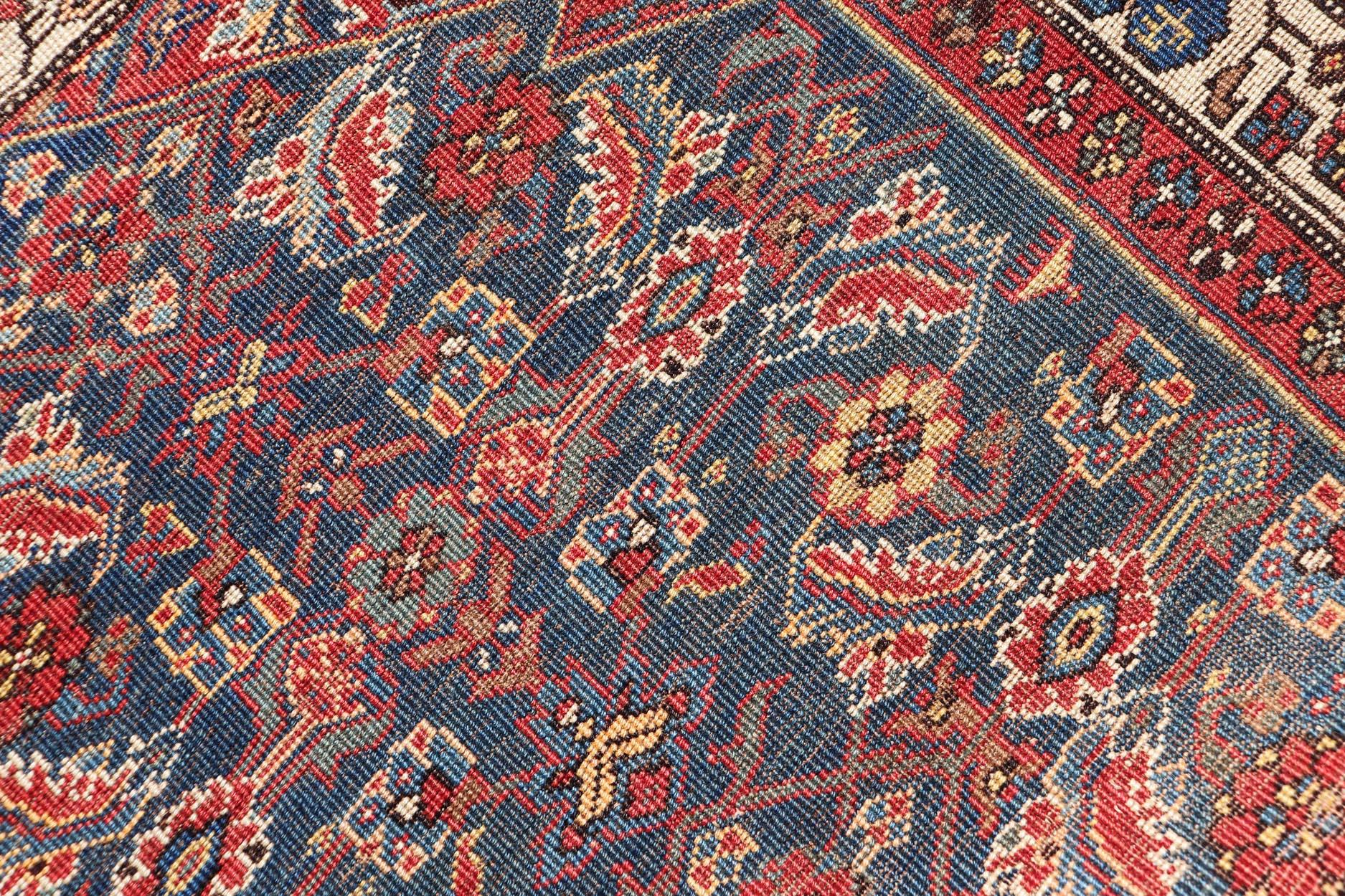 Hand-Knotted Antique Persian Bidjar Rug with Large Floral Motifs in Blue, Red, and Ivory For Sale
