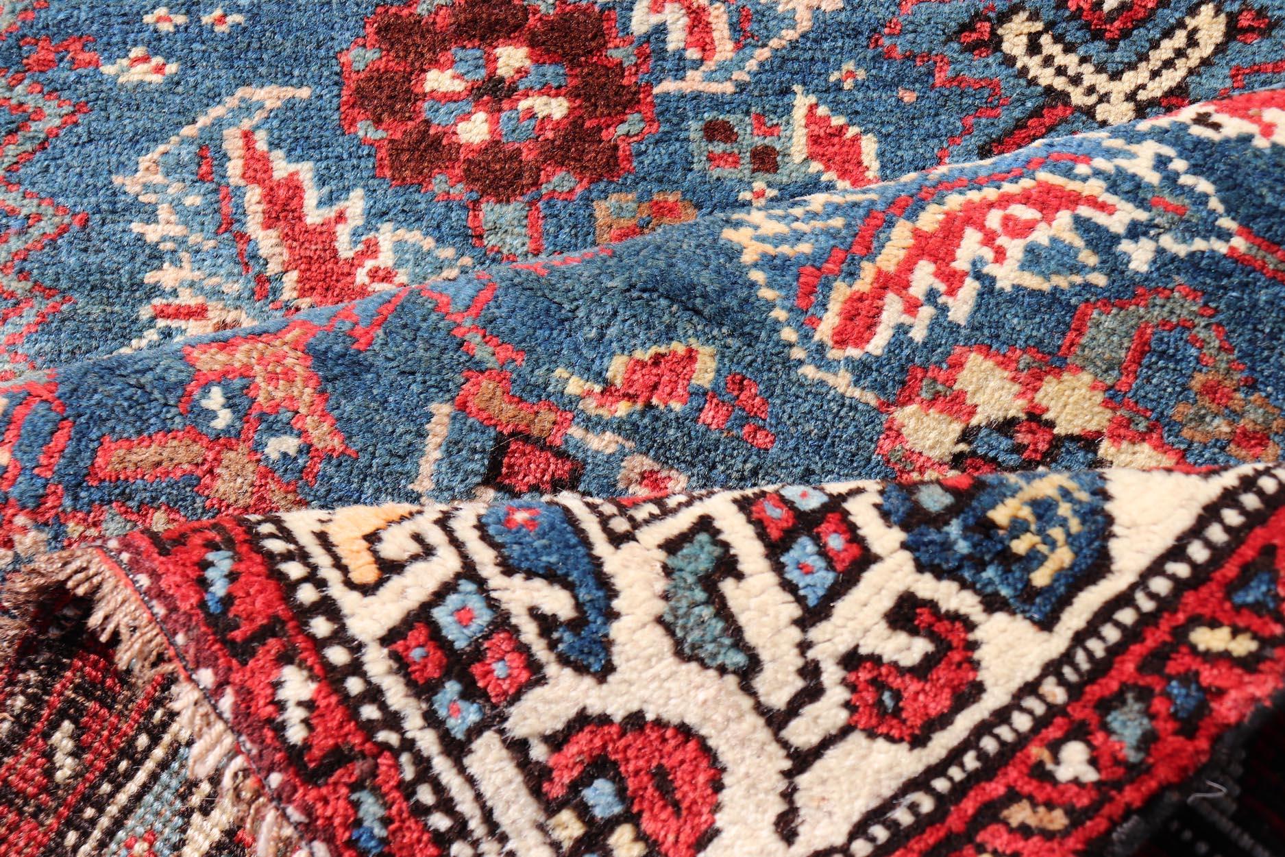 Antique Persian Bidjar Rug with Large Floral Motifs in Blue, Red, and Ivory In Excellent Condition For Sale In Atlanta, GA