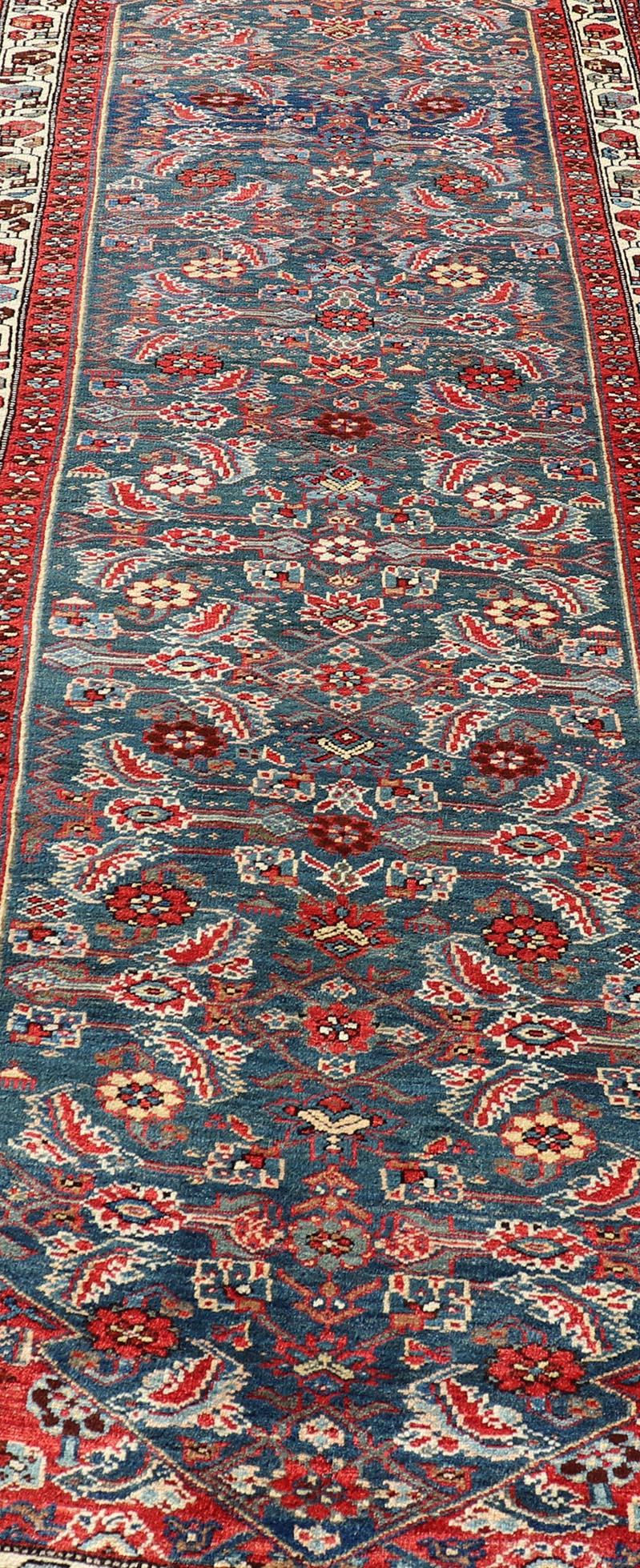 Late 19th Century Antique Persian Bidjar Rug with Large Floral Motifs in Blue, Red, and Ivory For Sale