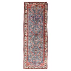 Tapis persan ancien Bidjar avec de grands motifs floraux en bleu, rouge et ivoire