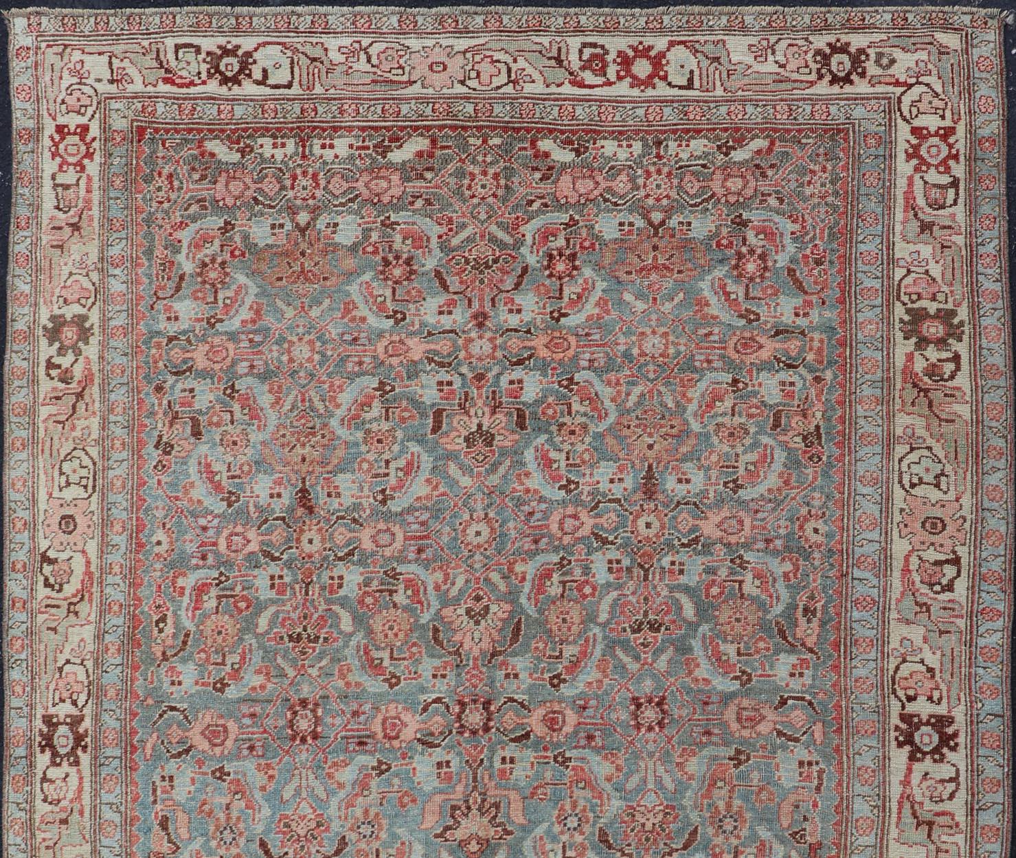 Antique Persian Bidjar rug with tribal herati design in light blue & soft coral.
Rug R20-94, country of origin / type: Iran / Bidjar, circa 1910.
Measures: 4'7 x 7'0.
This magnificent Bidjar with an exquisite, all-over Herati pattern, rests