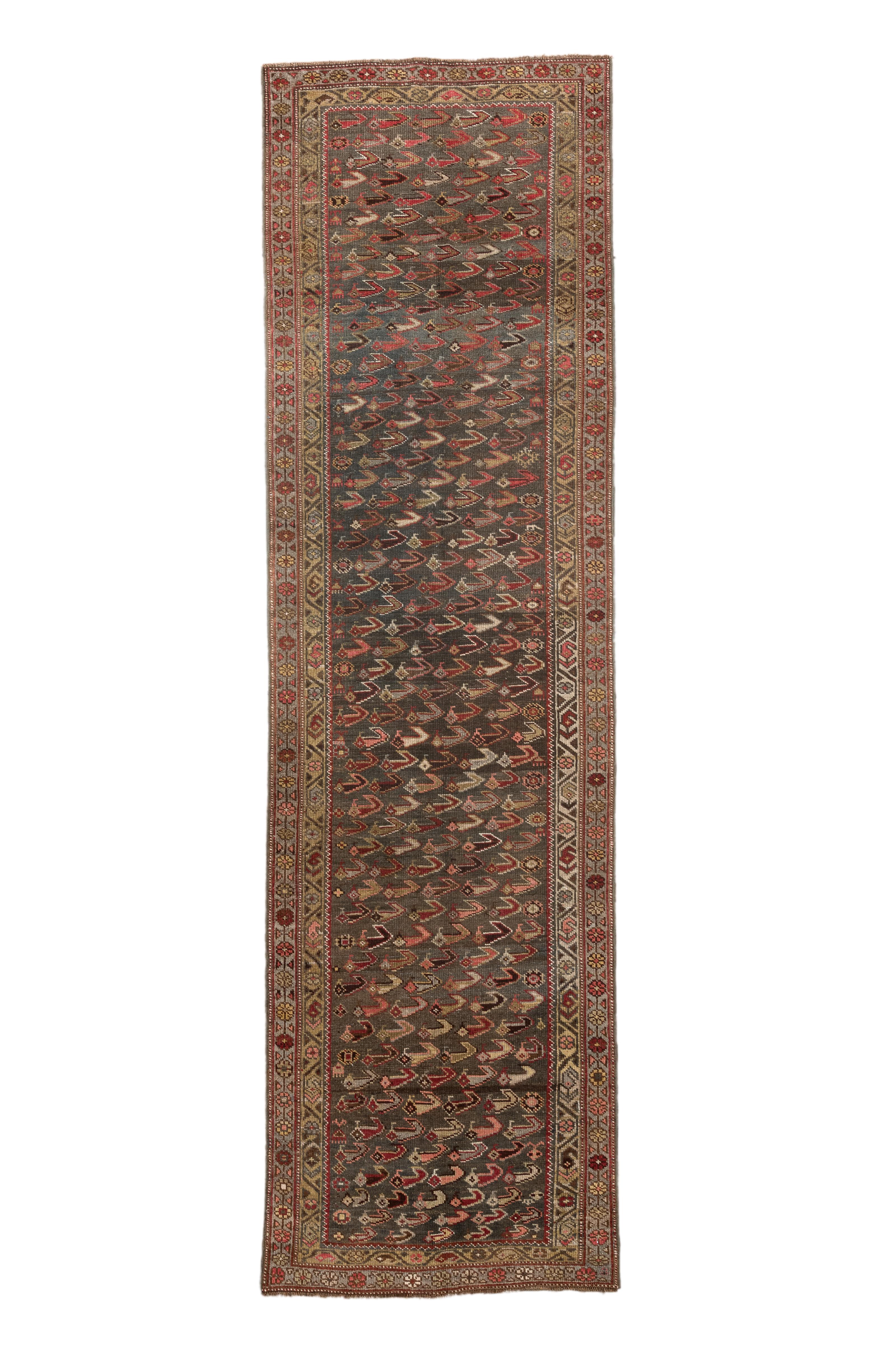 A stunning antique Persian Bidjar runner with an allover 